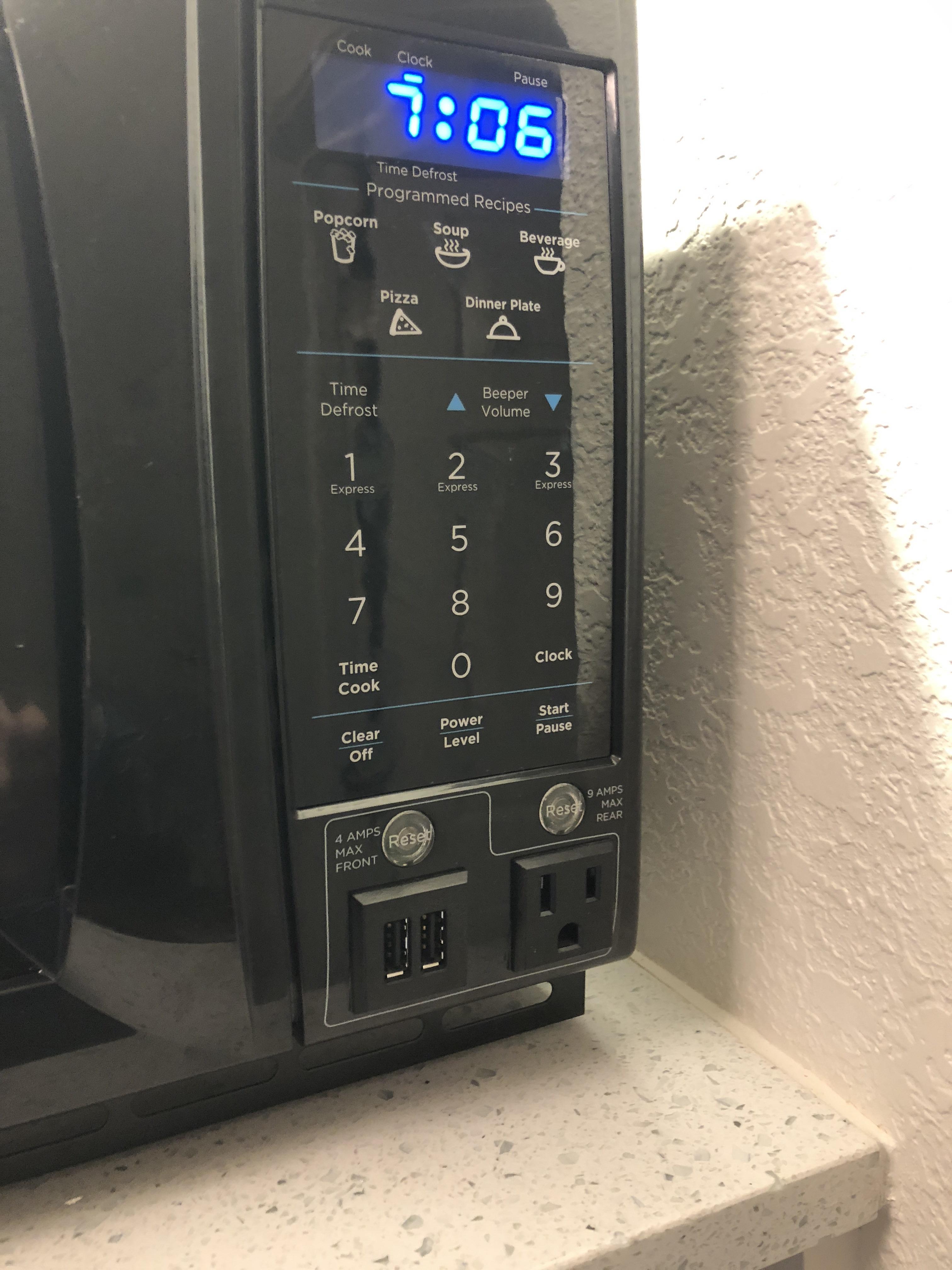 My hotel room microwave has charging ports r/mildlyinteresting
