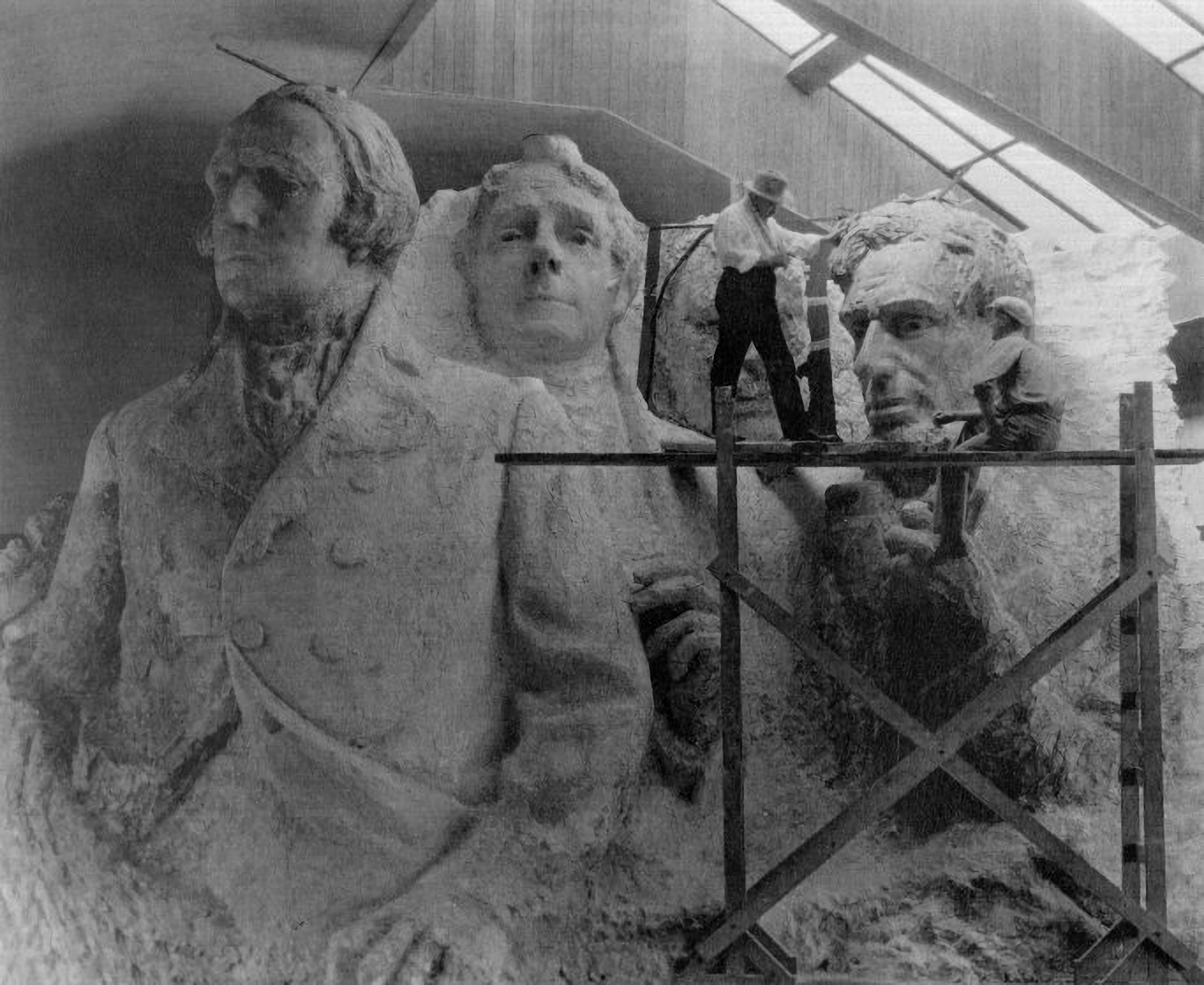 The sculptor of Mount Rushmore, Gutzon with a model of the