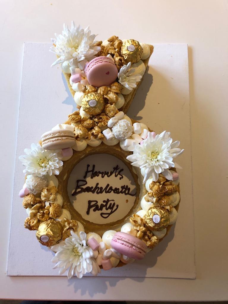 The wife made an engagement ring cake. (White chocolate mud) r/Baking