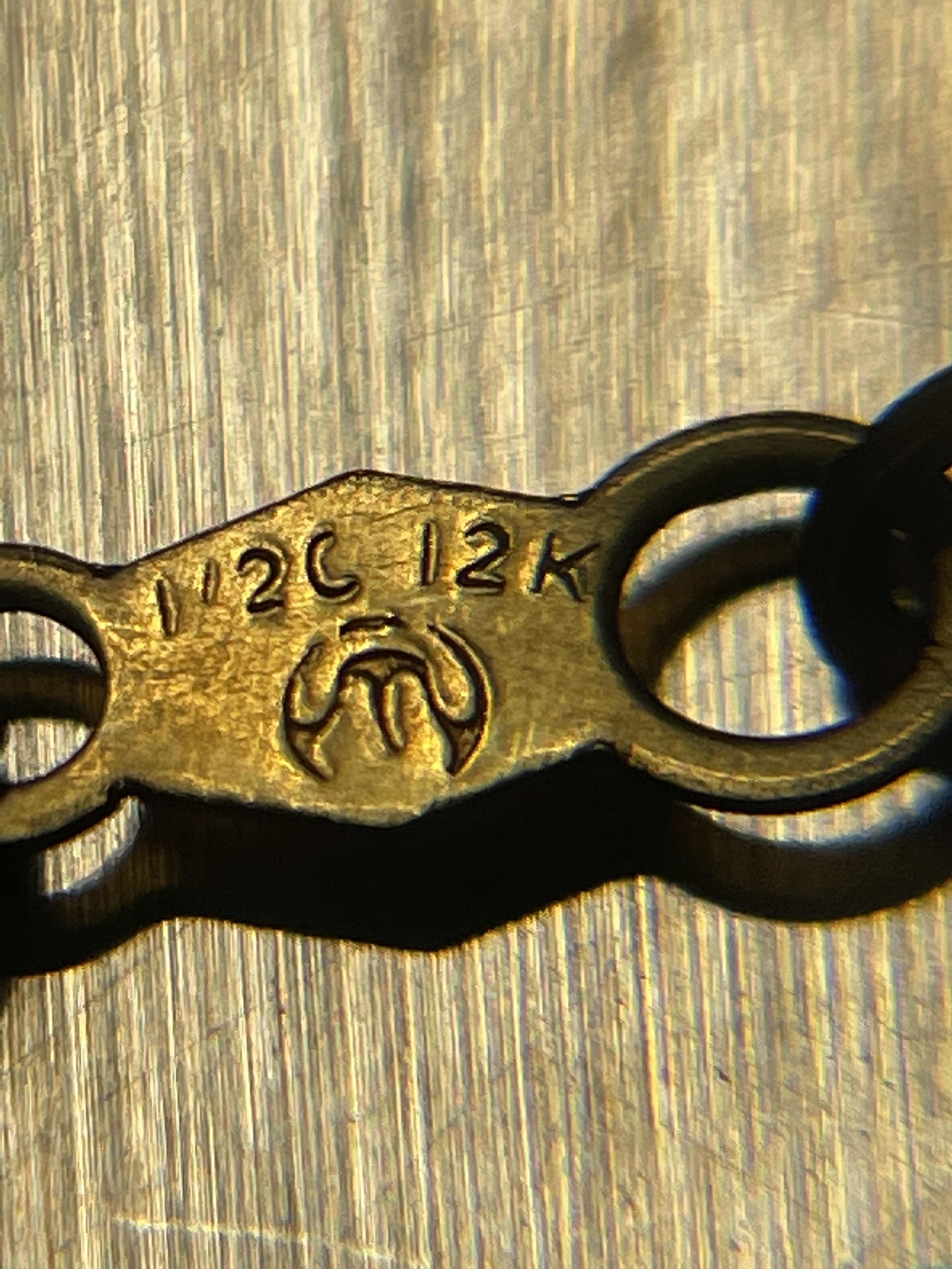 What is the 1/2 mean? I know 12k means 12 karat. Does it mean half