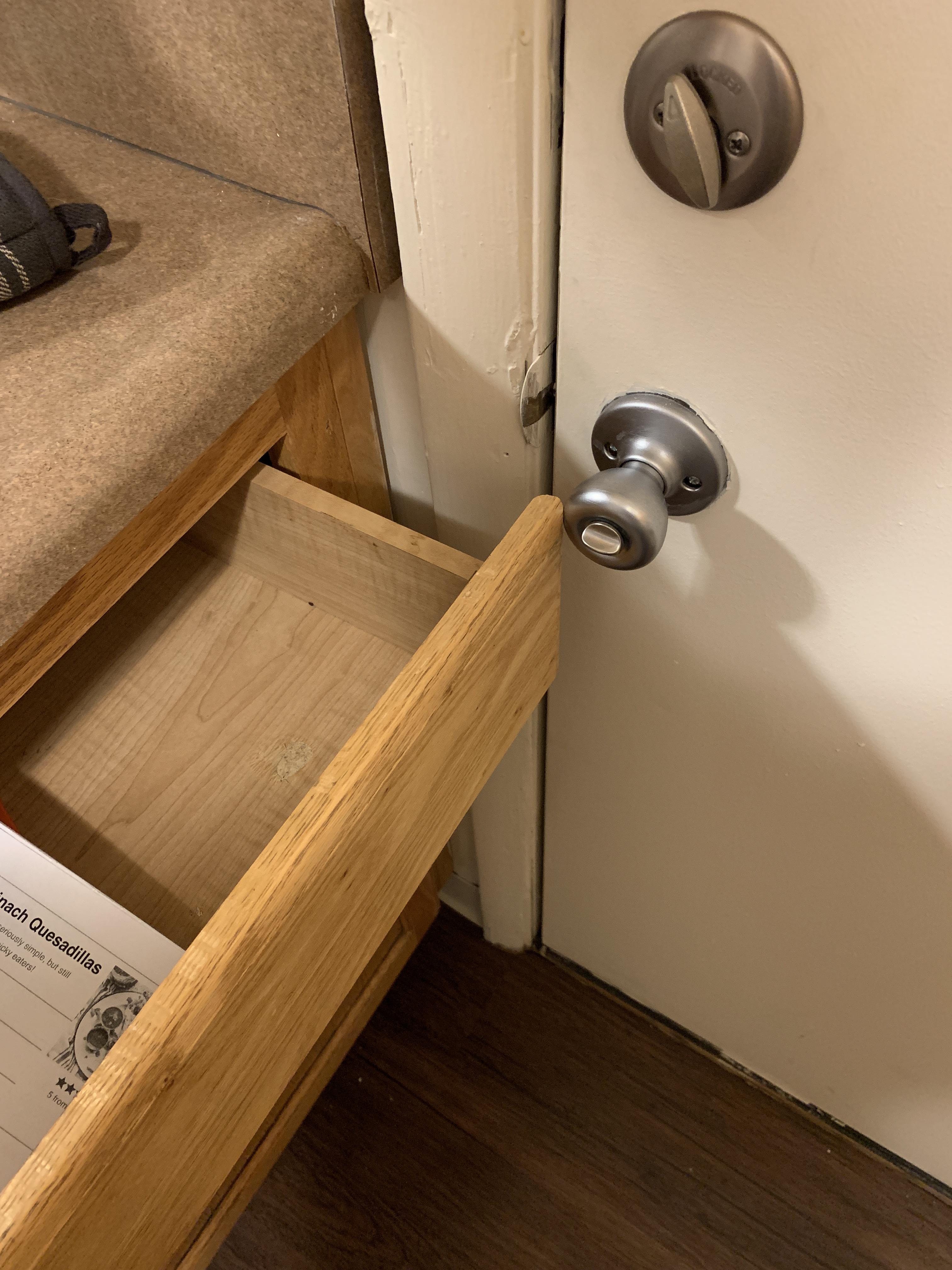 The drawer hits the back door in my townhomes kitchen. r/CrappyDesign