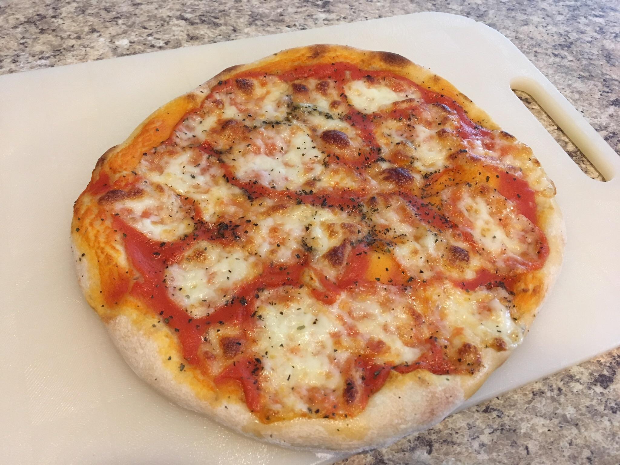 First homemade dough on a pizza stone! r/Pizza