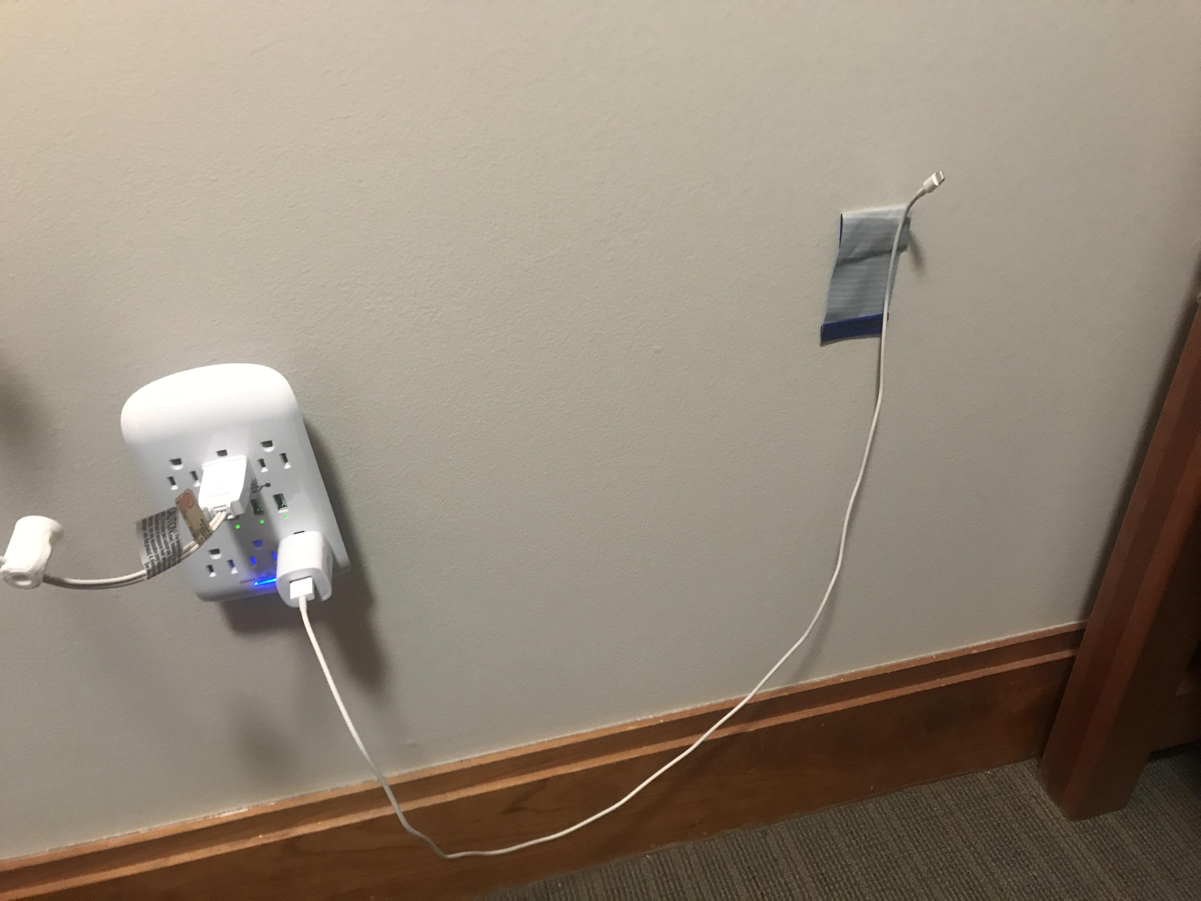 My friends ingenious solution to his charger always falling/not