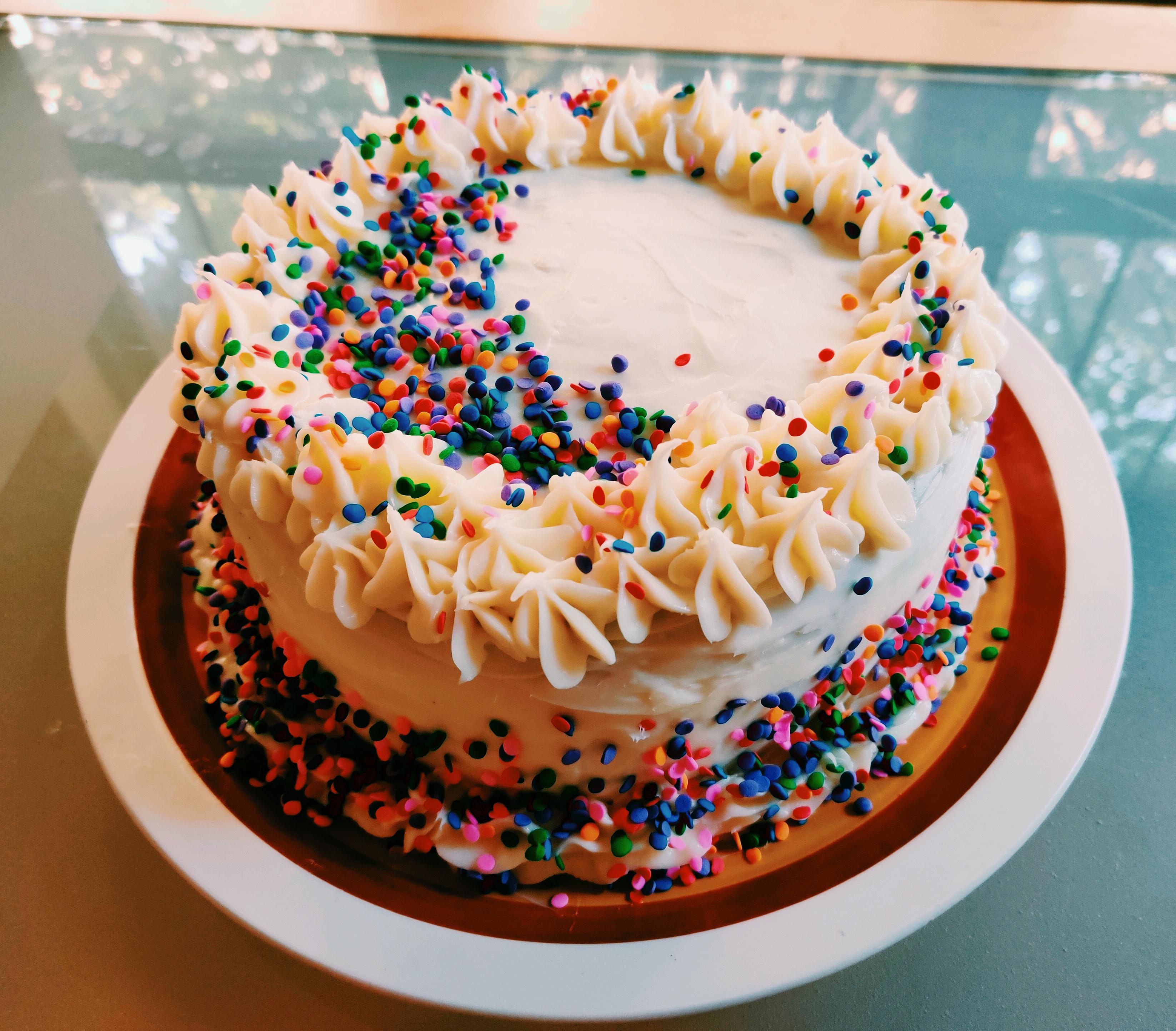 Devil's food birthday cake with salted caramel buttercream filling and vanilla cream cheese