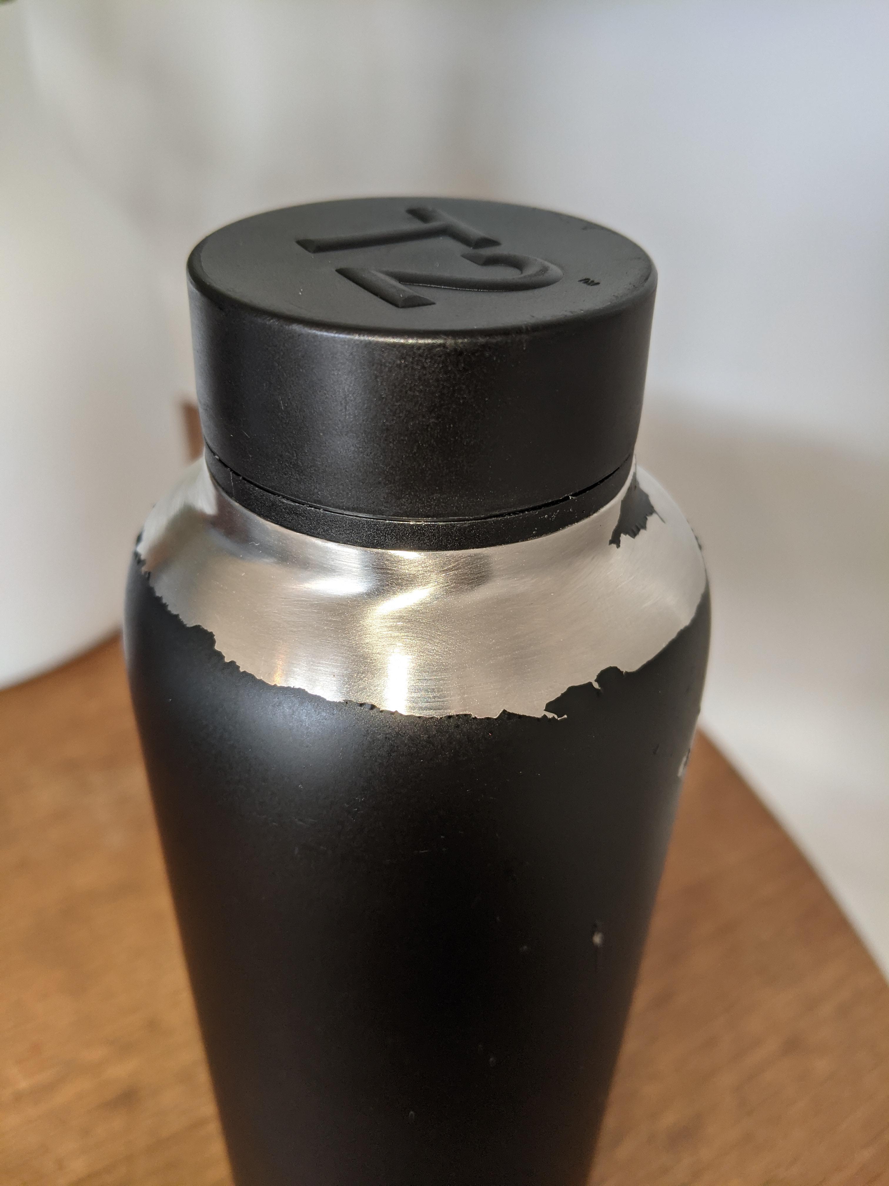 [howto] How can I strip this water bottle of the black stuff that's