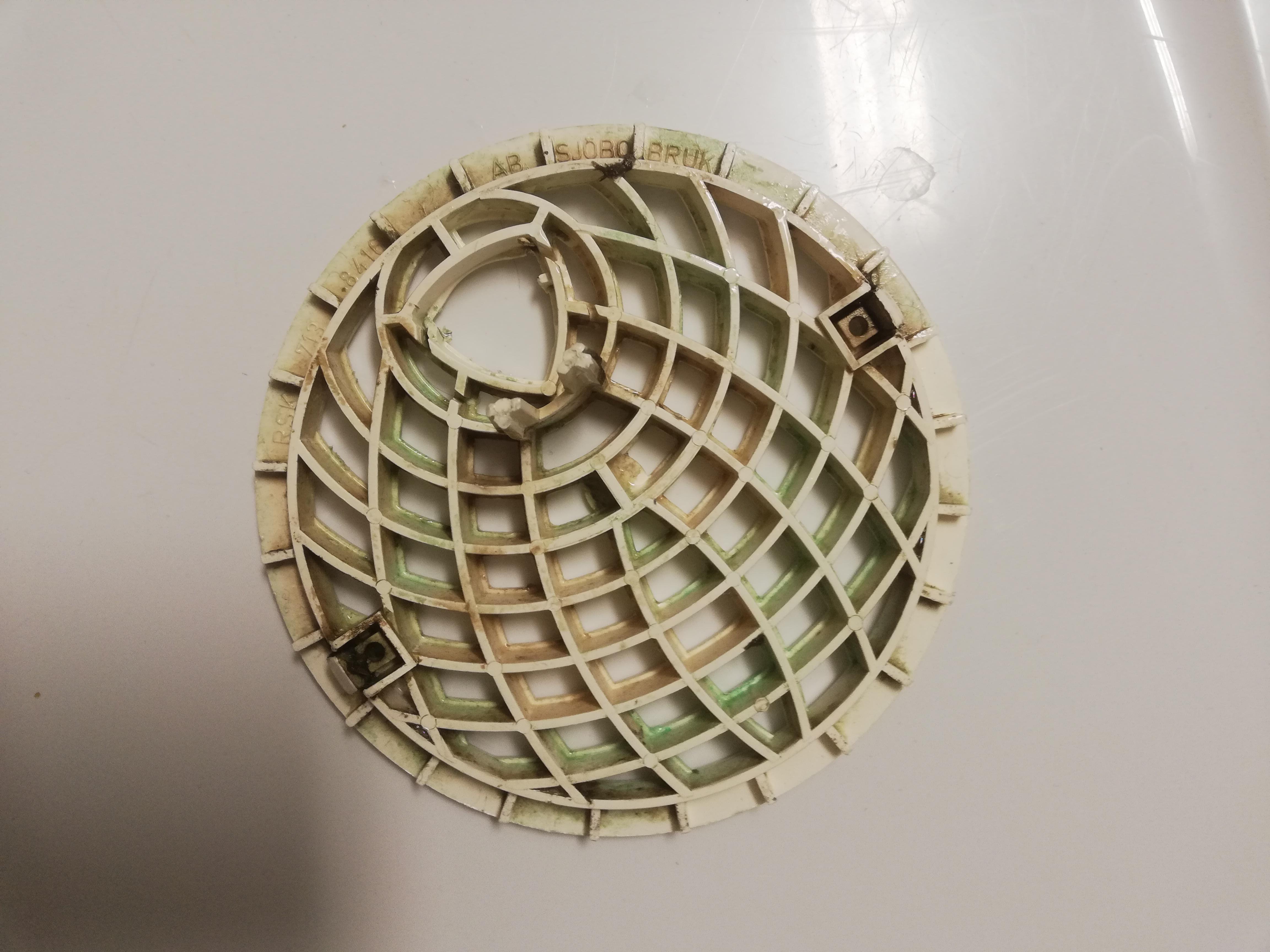 Any tips on how to clean this shower hair catcher? Tried cleaning it