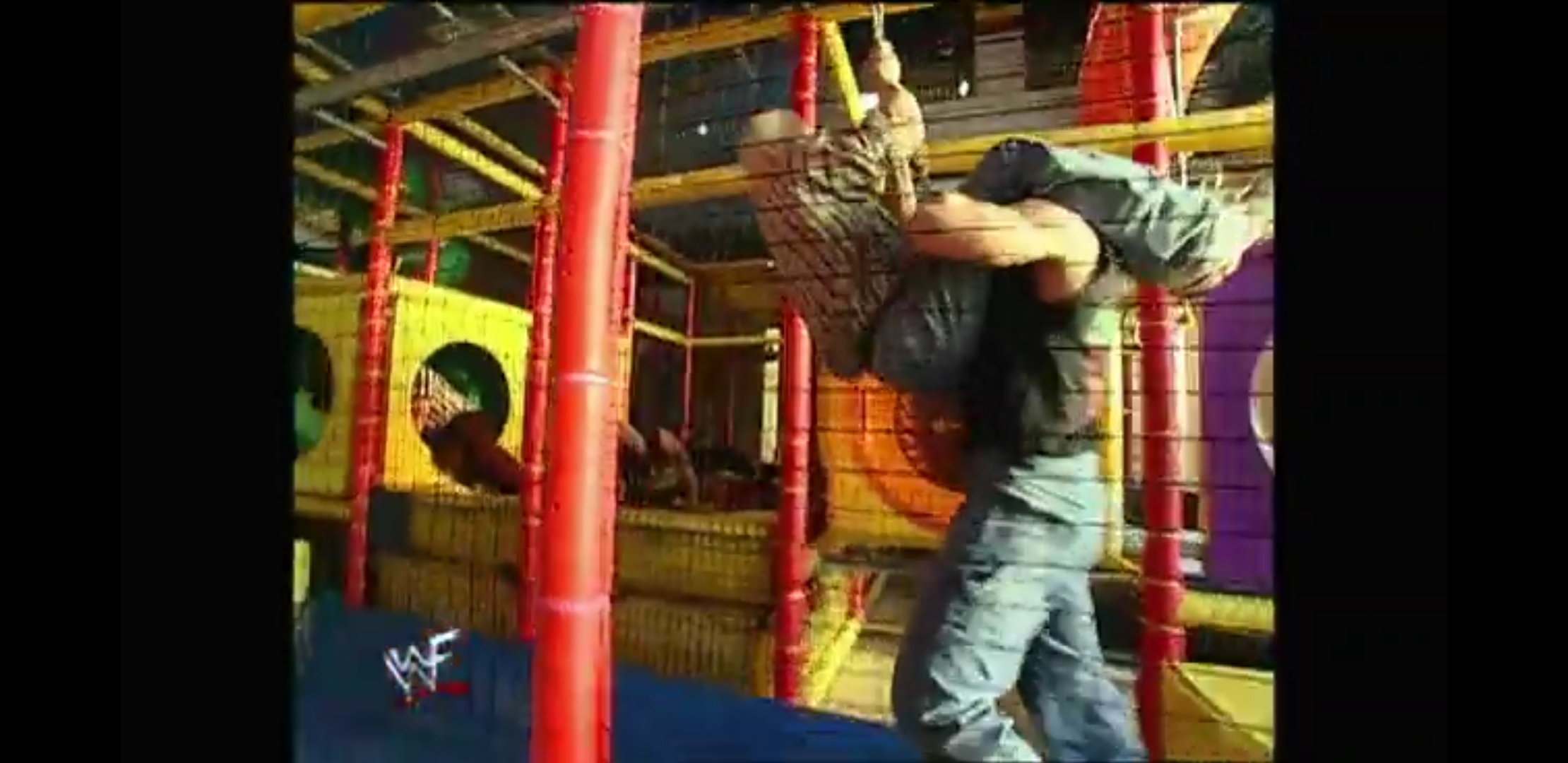 Crash Holly defending his Hardcore Championship against The Posse in a