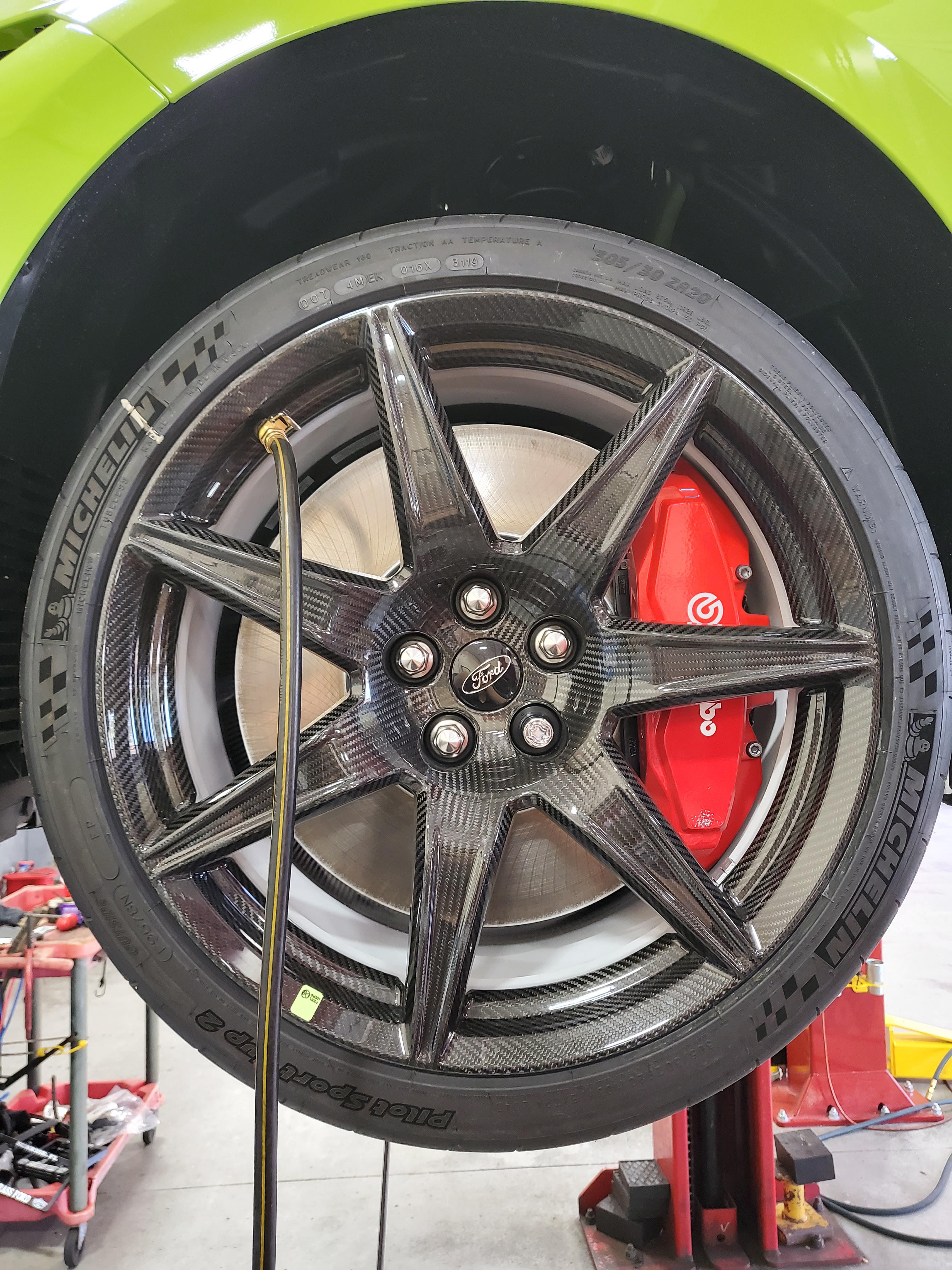Exposed carbon fiber wheels on GT500 carbon track package r/carporn
