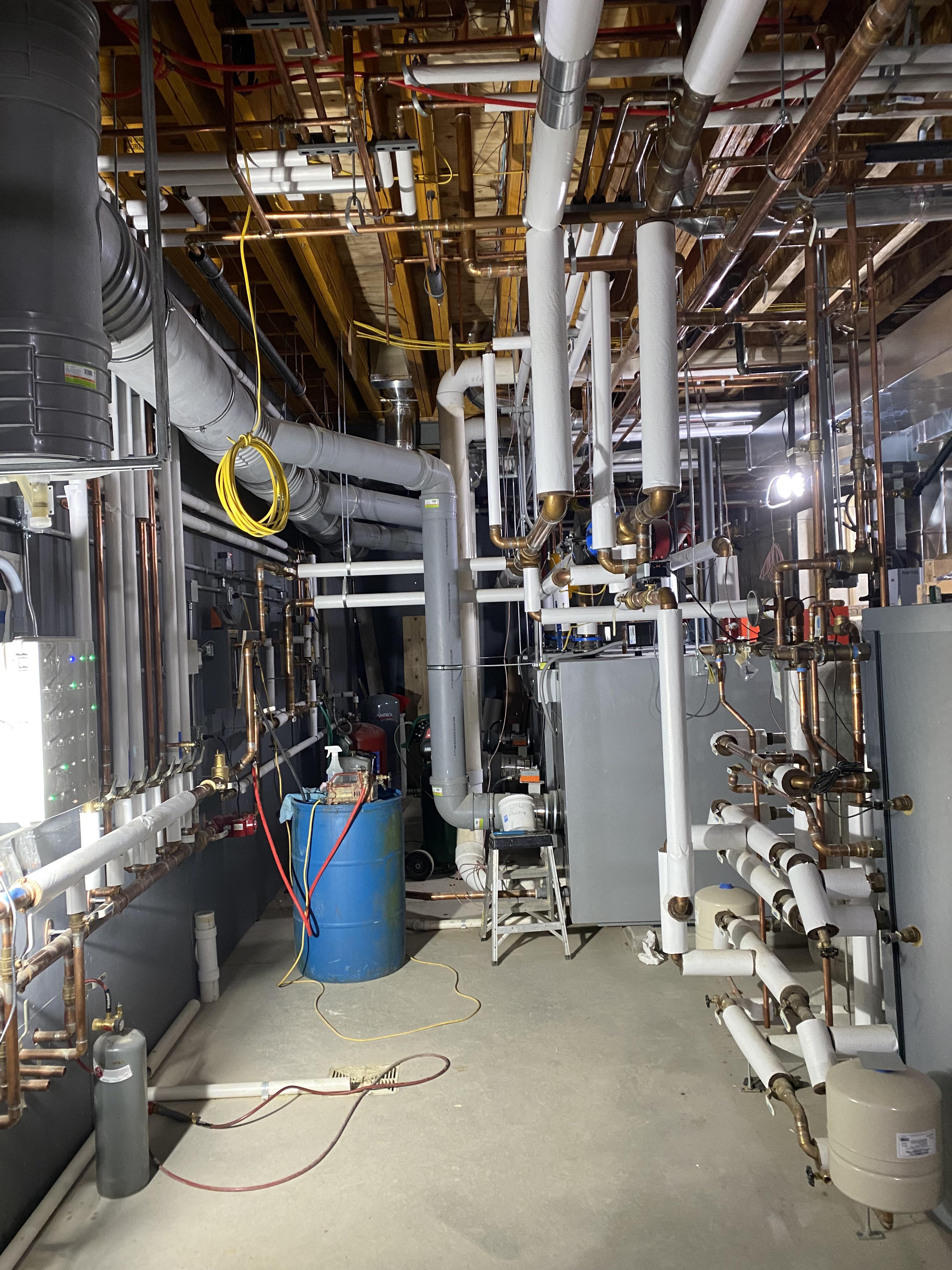 Part of the mechanical room for a residential home r/Plumbing