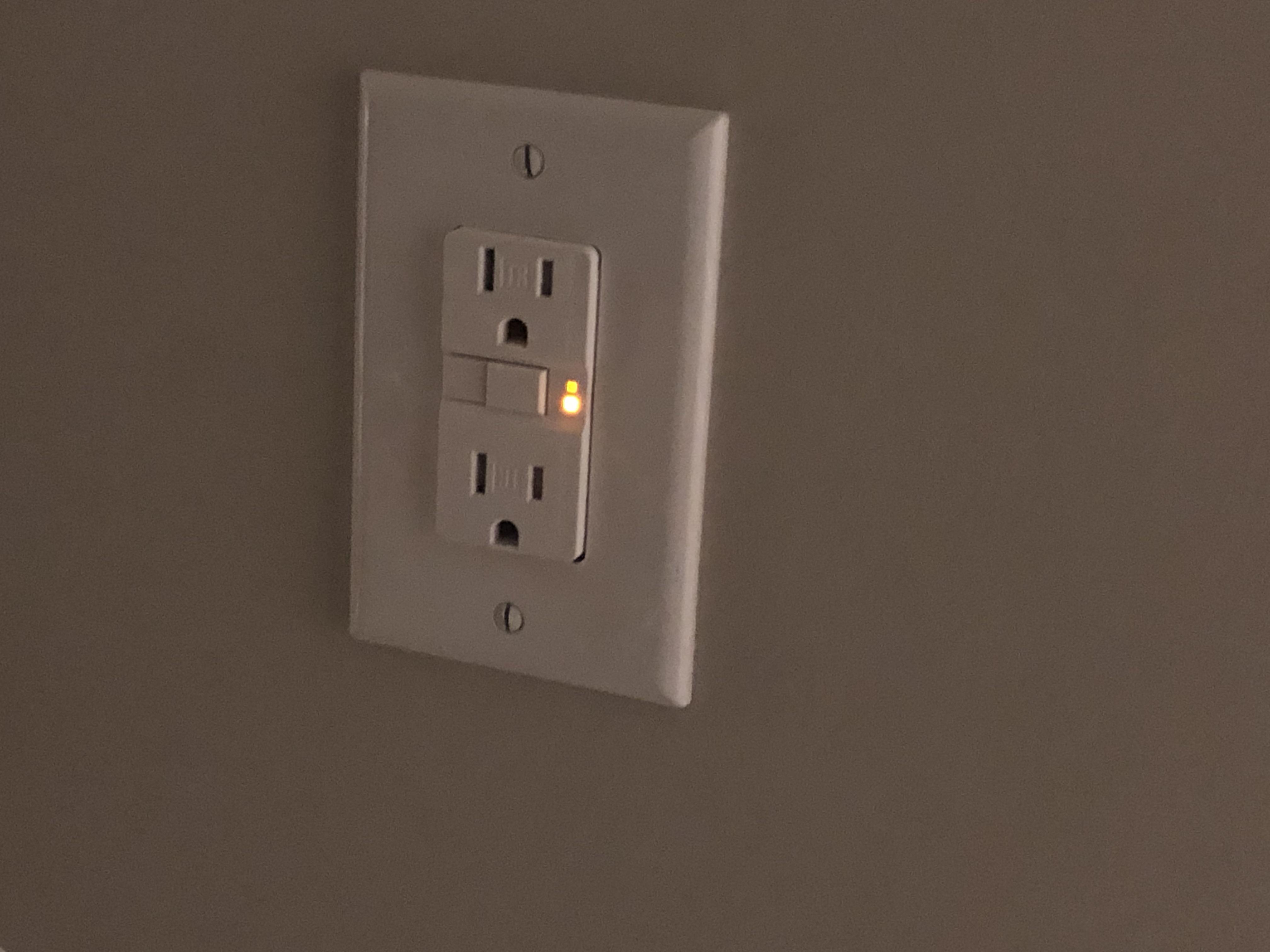 Orange light flashing through wall socket r/electrical
