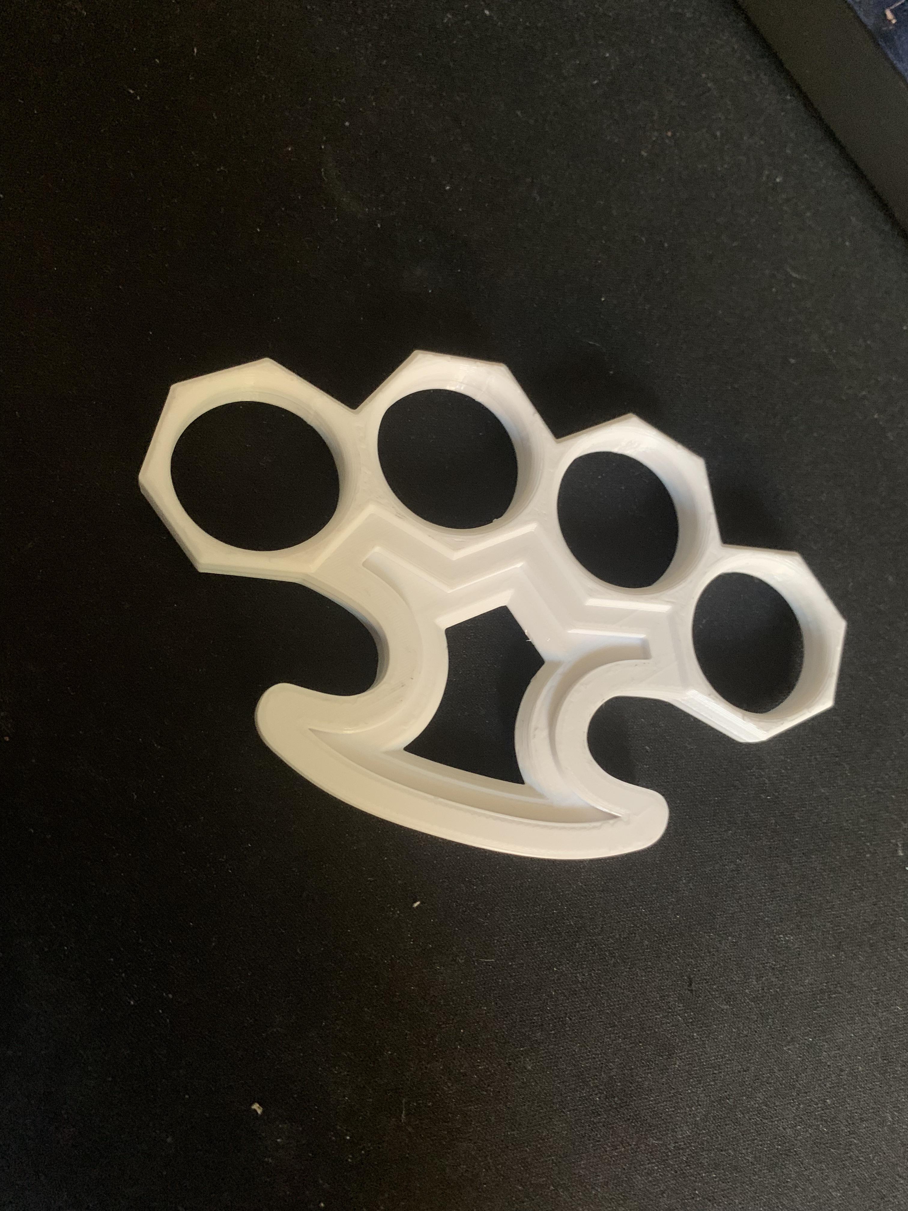3D Printed ”Brass” Knuckles! My own design so I’m pretty proud. On