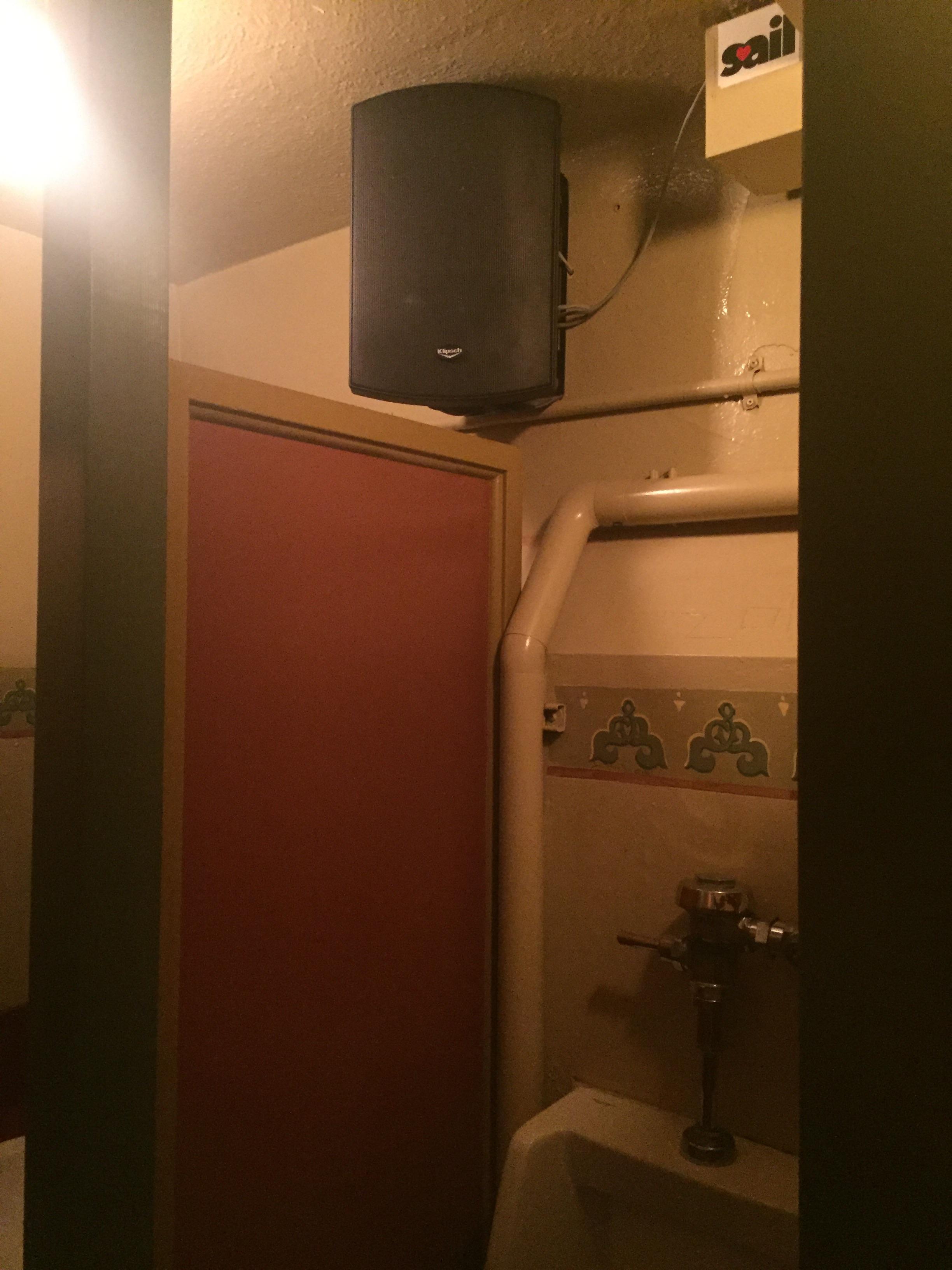 This theater has speakers in the bathroom so you can still hear the