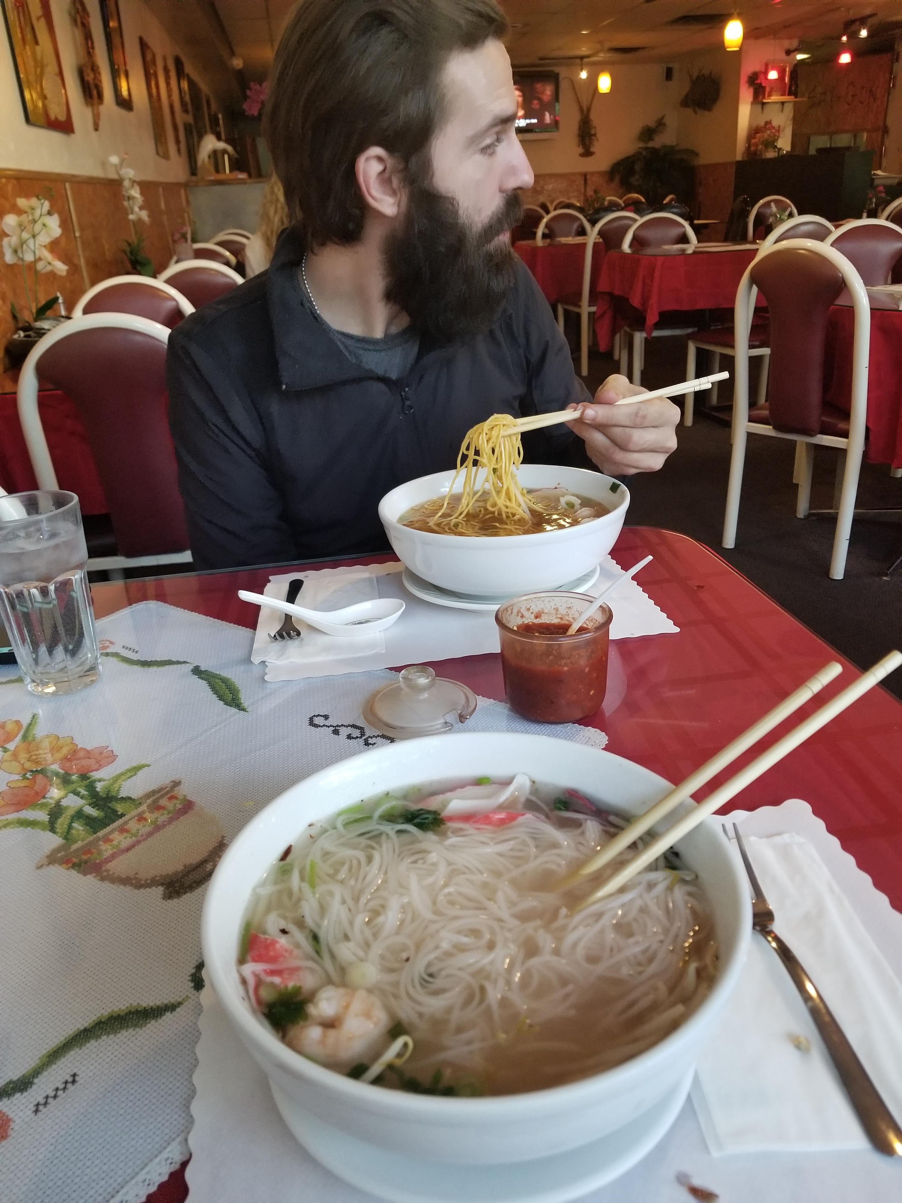 My seafood pho is the best. (He gets egg noodles cuz hes a traitor) r/pho