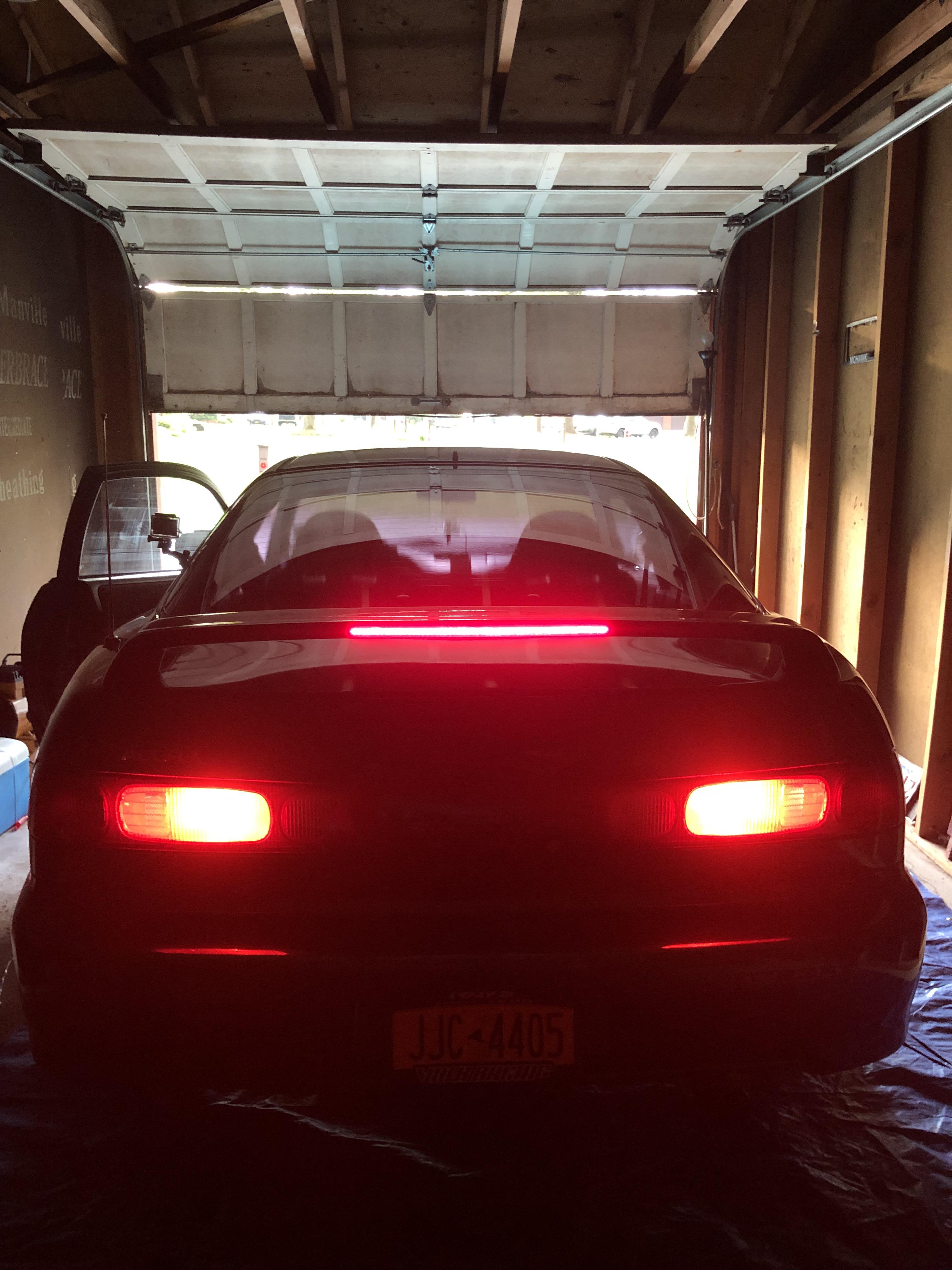 Got my 90’s Impreza tail light wired up on my 94 Integra today. Love having something different