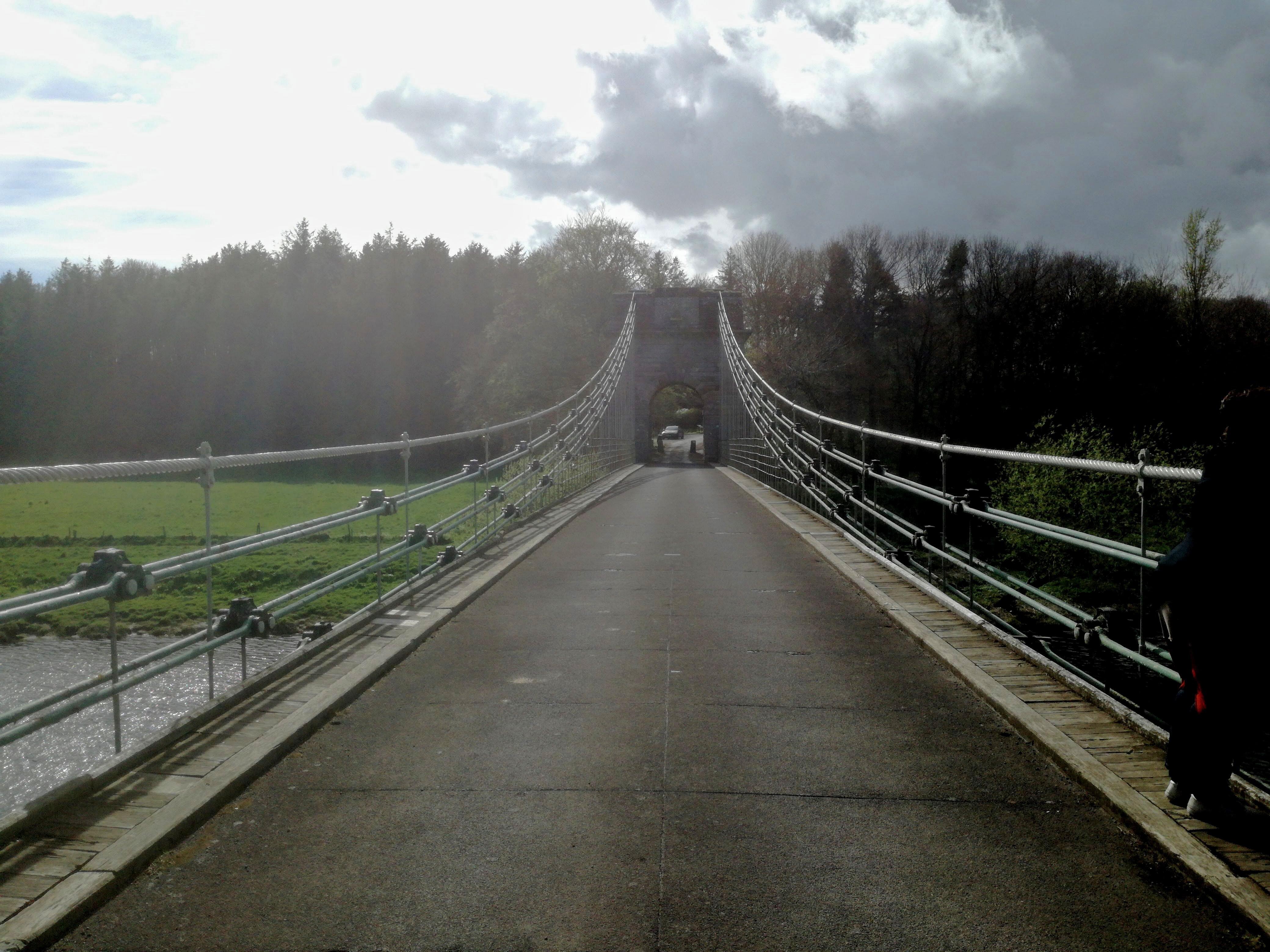 The Union Bridge, a wroughtiron chain suspension bridge over the river