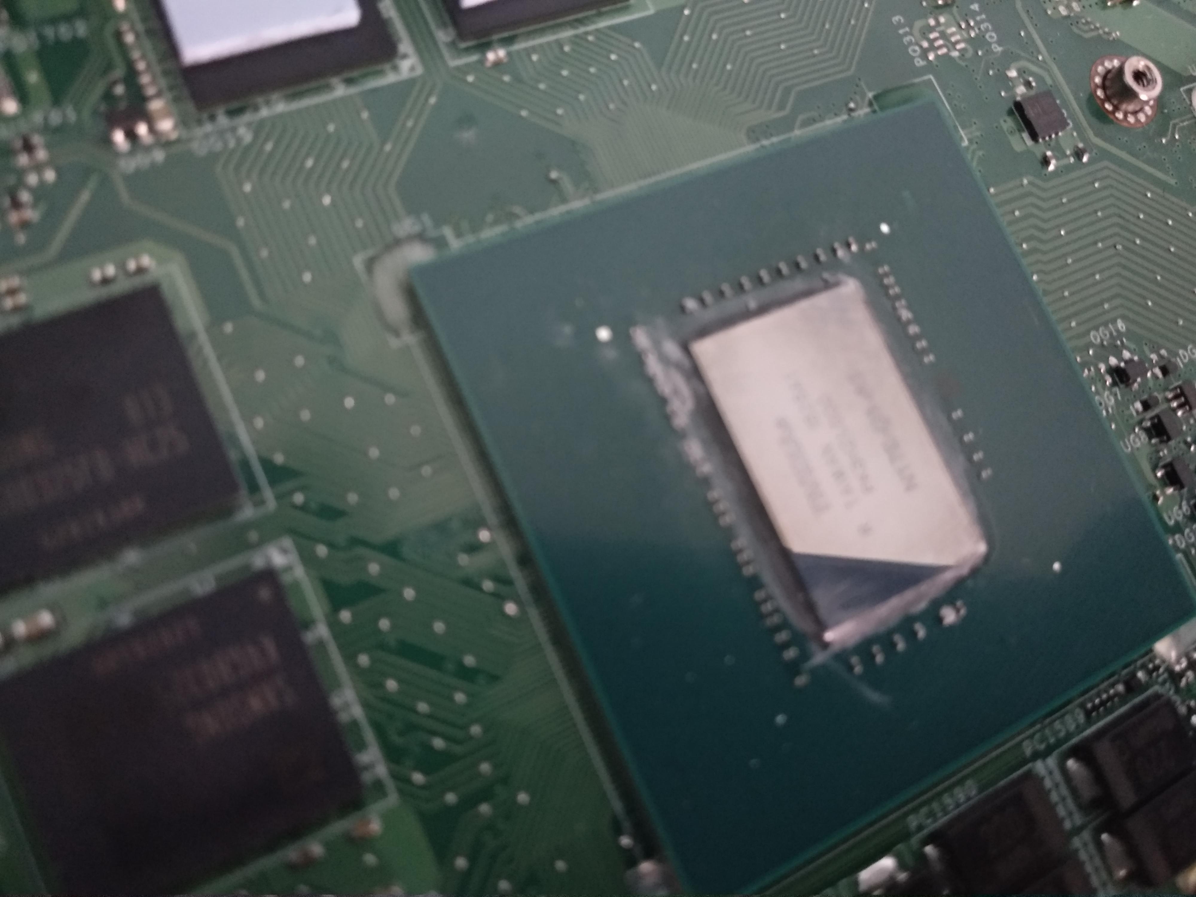Trying to change thermal paste on my laptop, some old paste got between