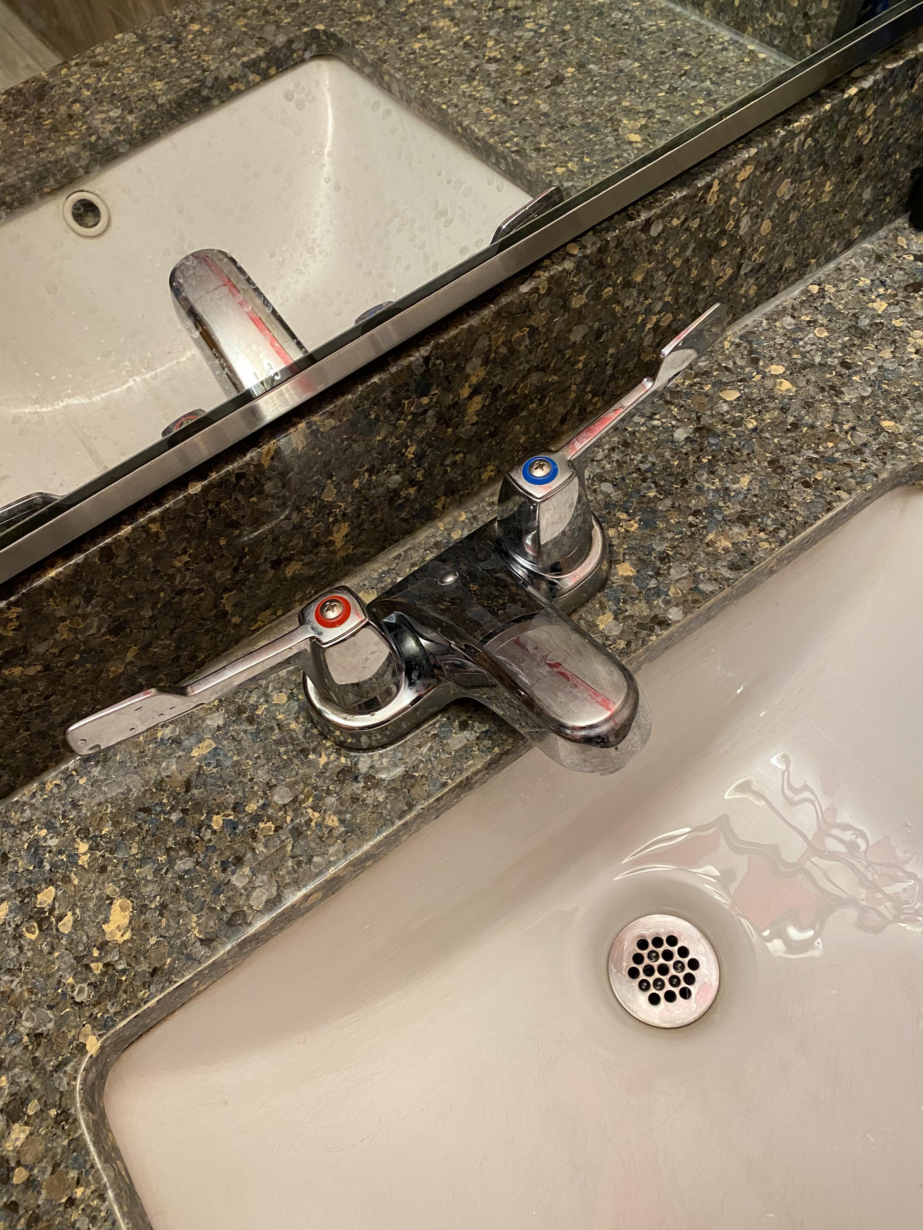 Bathroom sink faucets. Why do they make the neck so short?? r