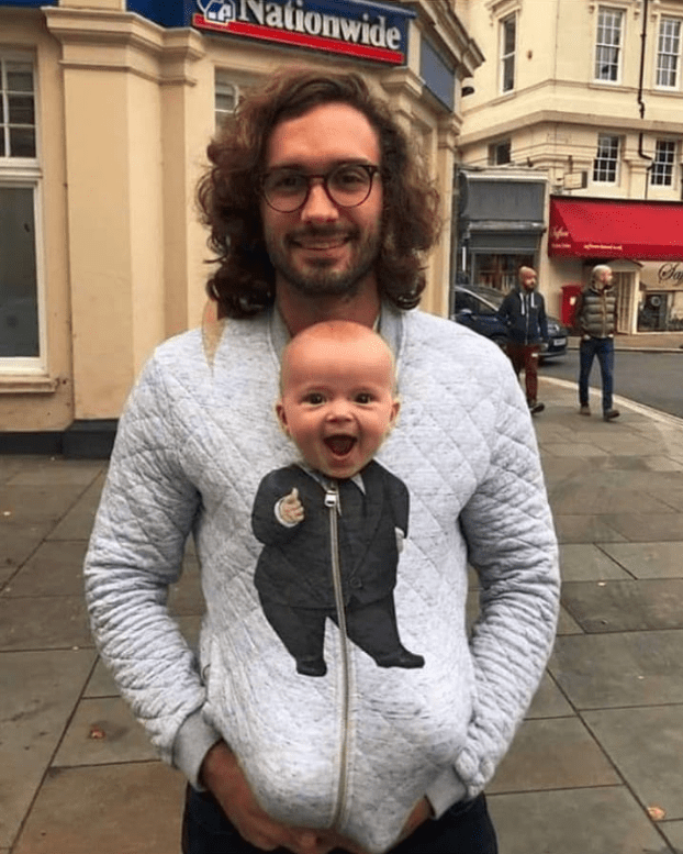 a little boy in a little suit. r/aww
