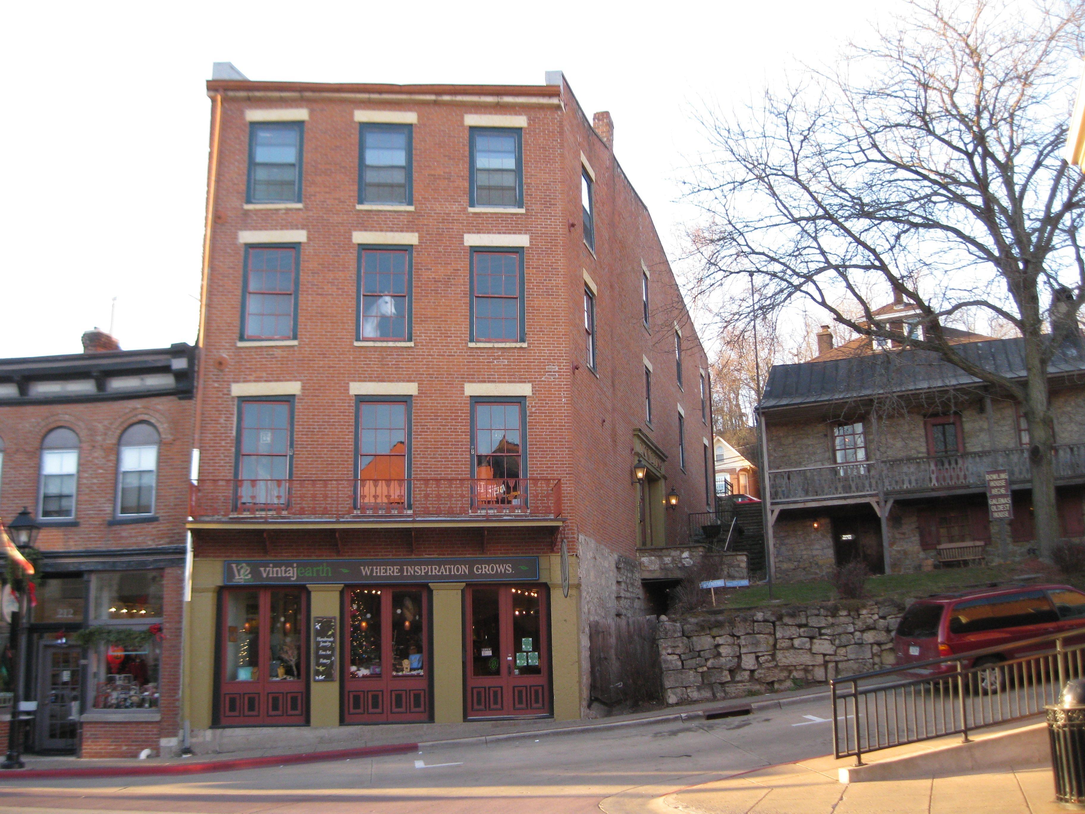 Horse gazing through a window in Galena, Illinois r/pics