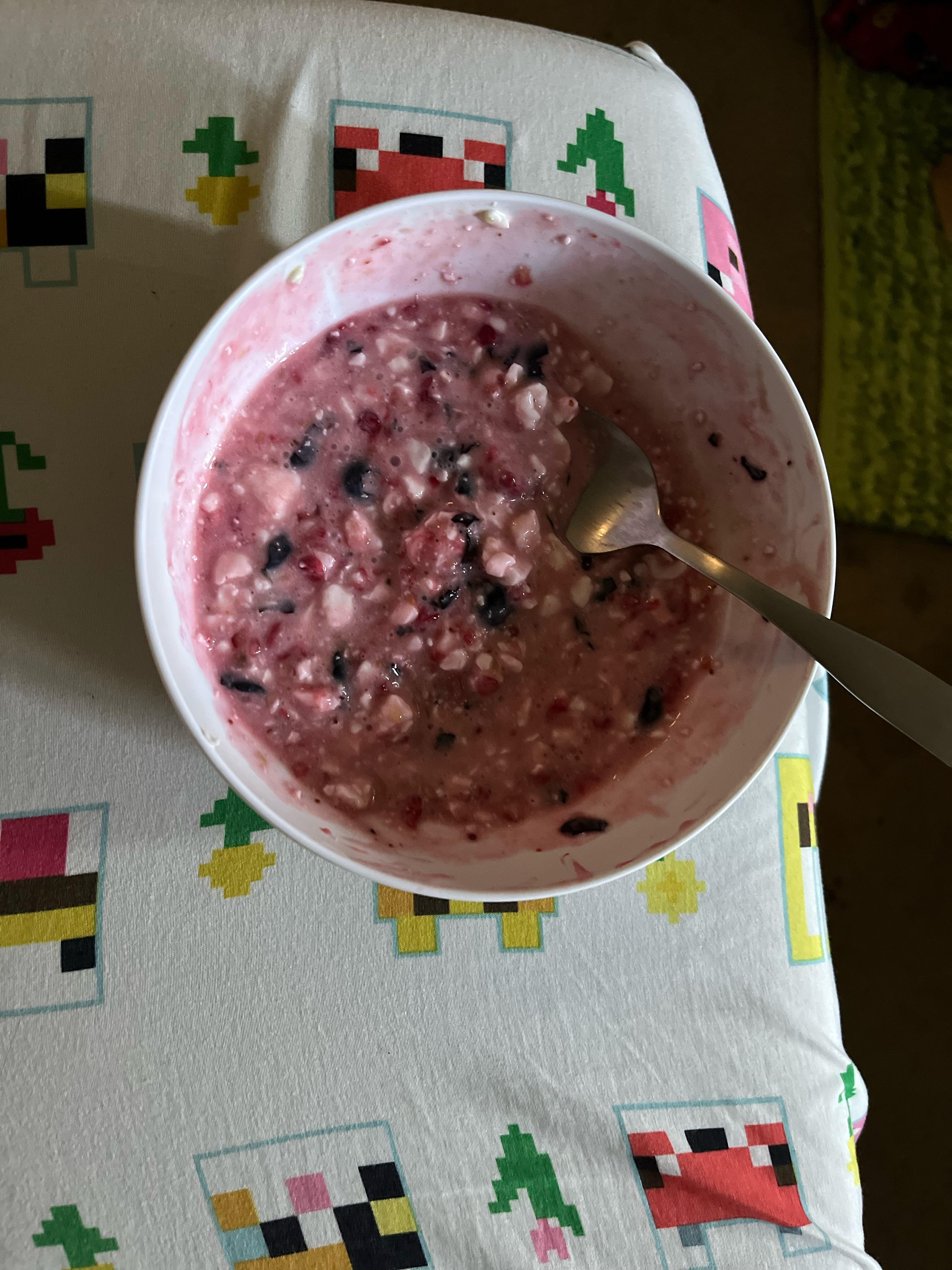 cottage cheese with squished raspberries and blueberries because they