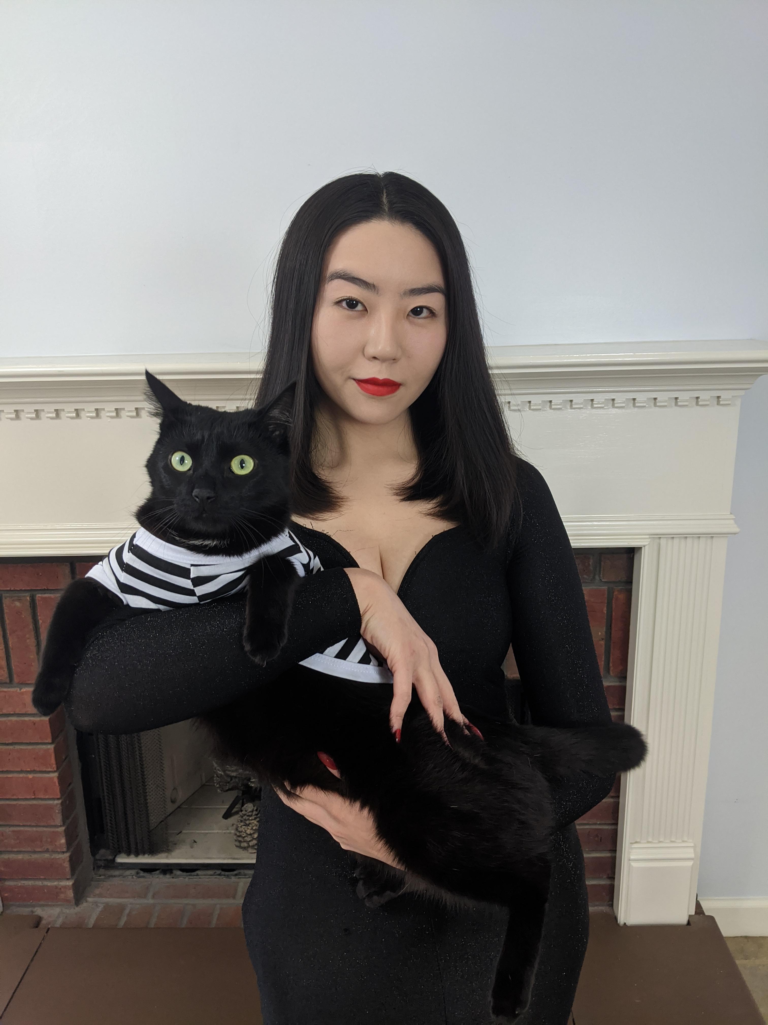 Me and my cat dressed up as Morticia and Pugsley Addams r/aww
