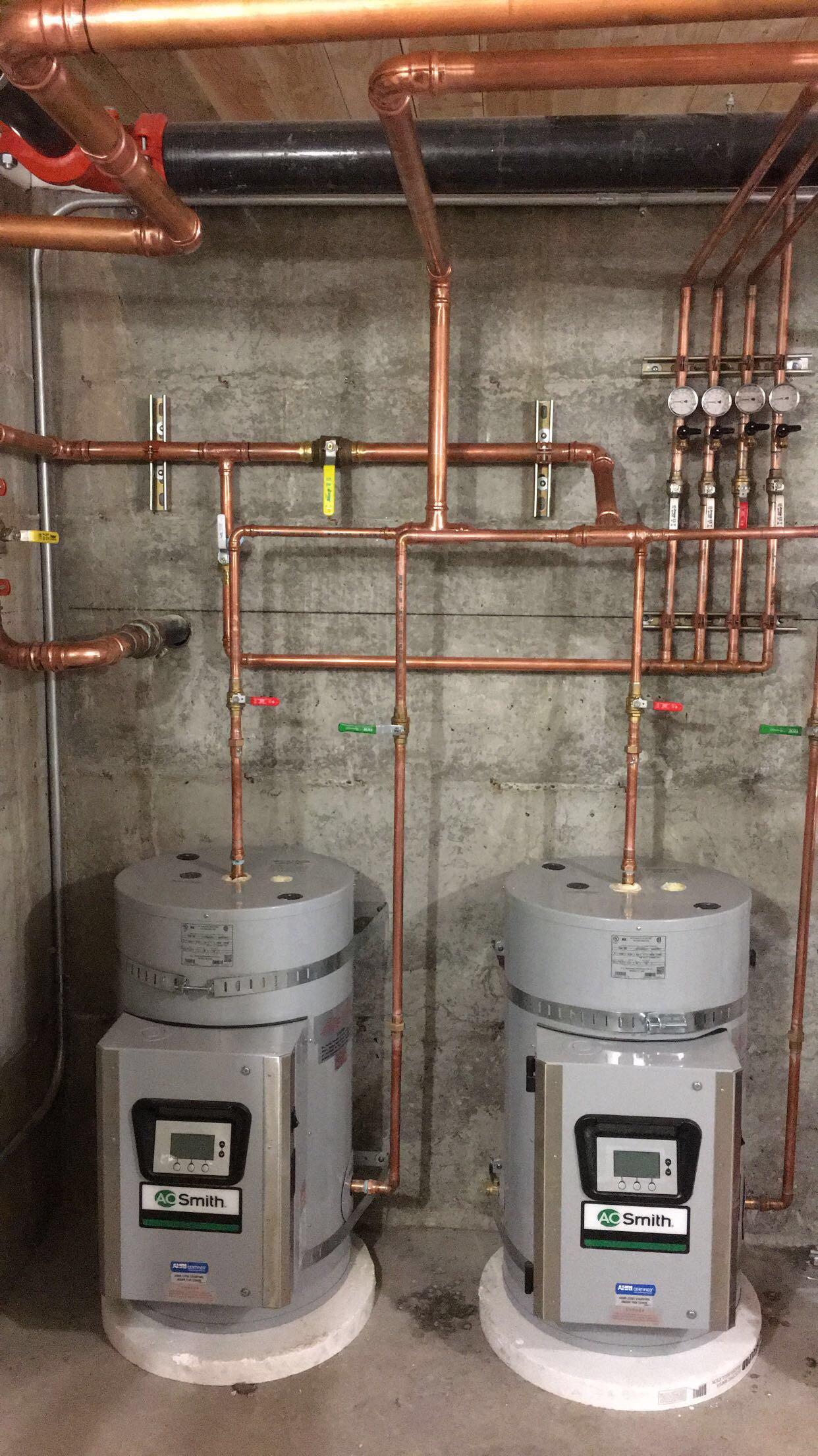 Water Heaters we did in a 20 unit building in Seattle. Plumbing