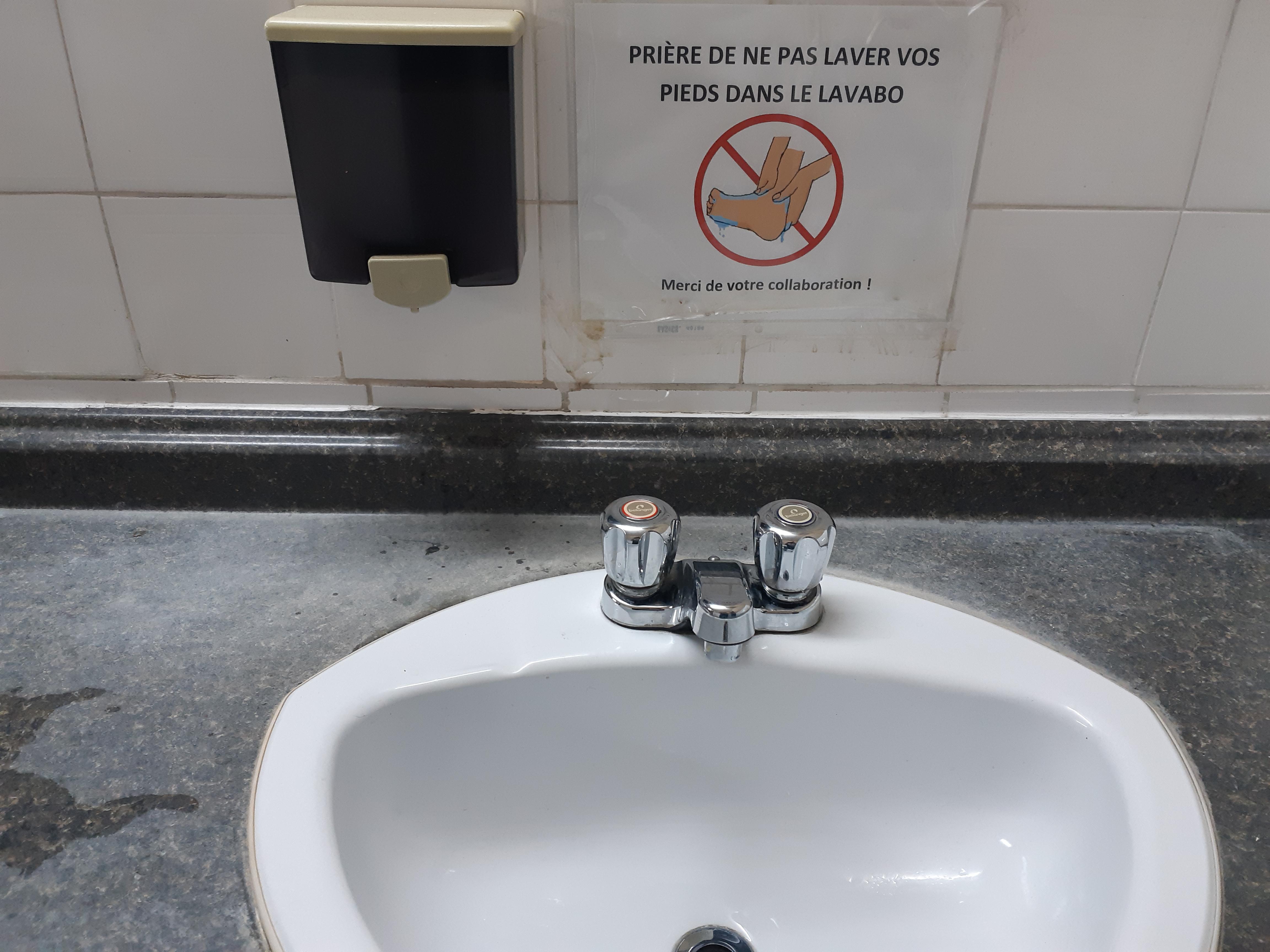 Please don't clean your feet in the school's sink. Come on people. r