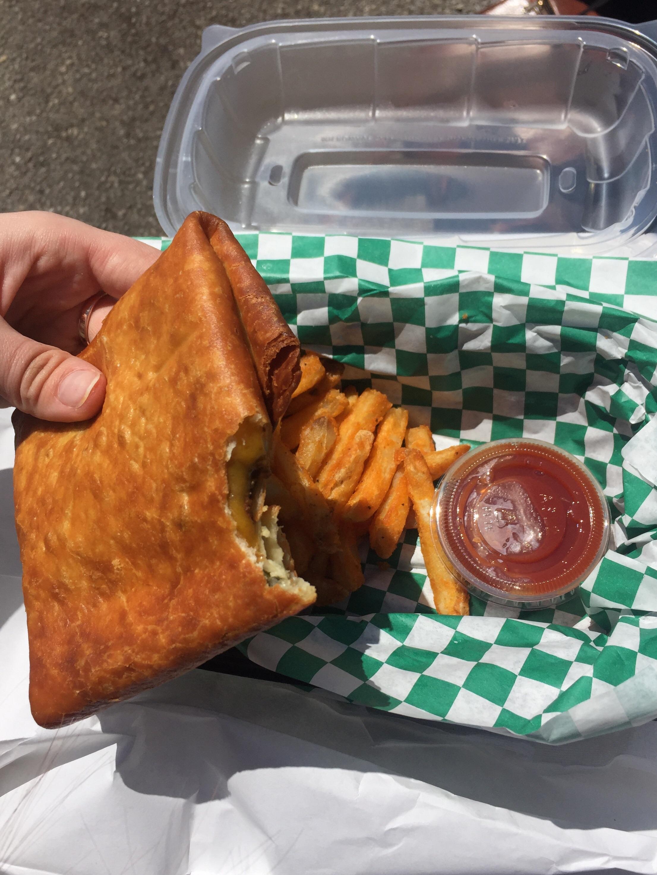 Pizza puff w/ sausage, cheese & spinach, plus fries & mild sauce from