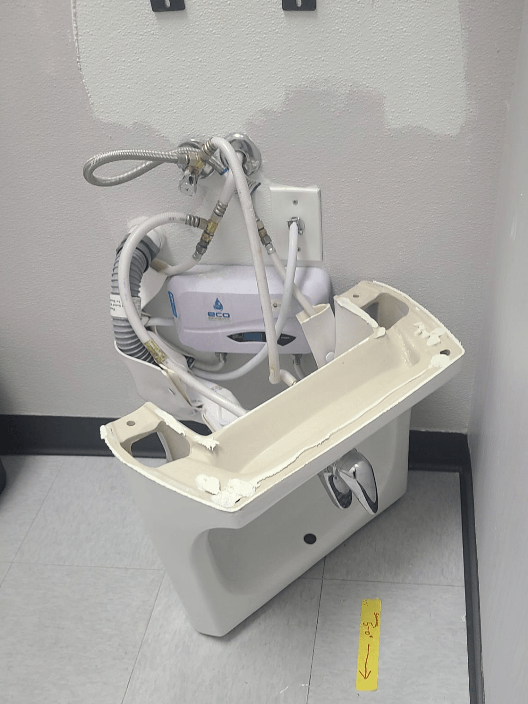 The sink just randomly fell off the wall at work r/mildlyinteresting