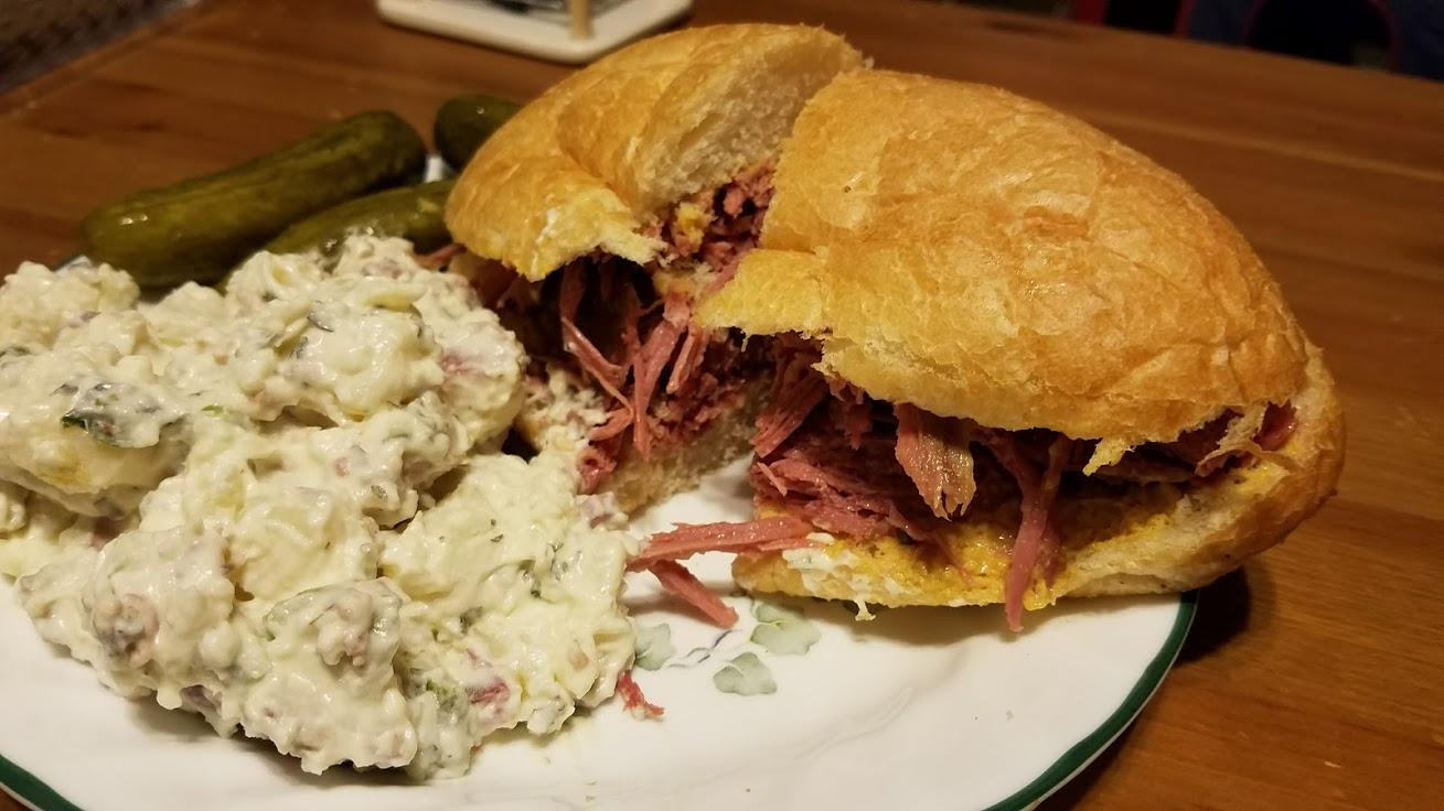 Corned beef sandwich with potato salad r/eatsandwiches