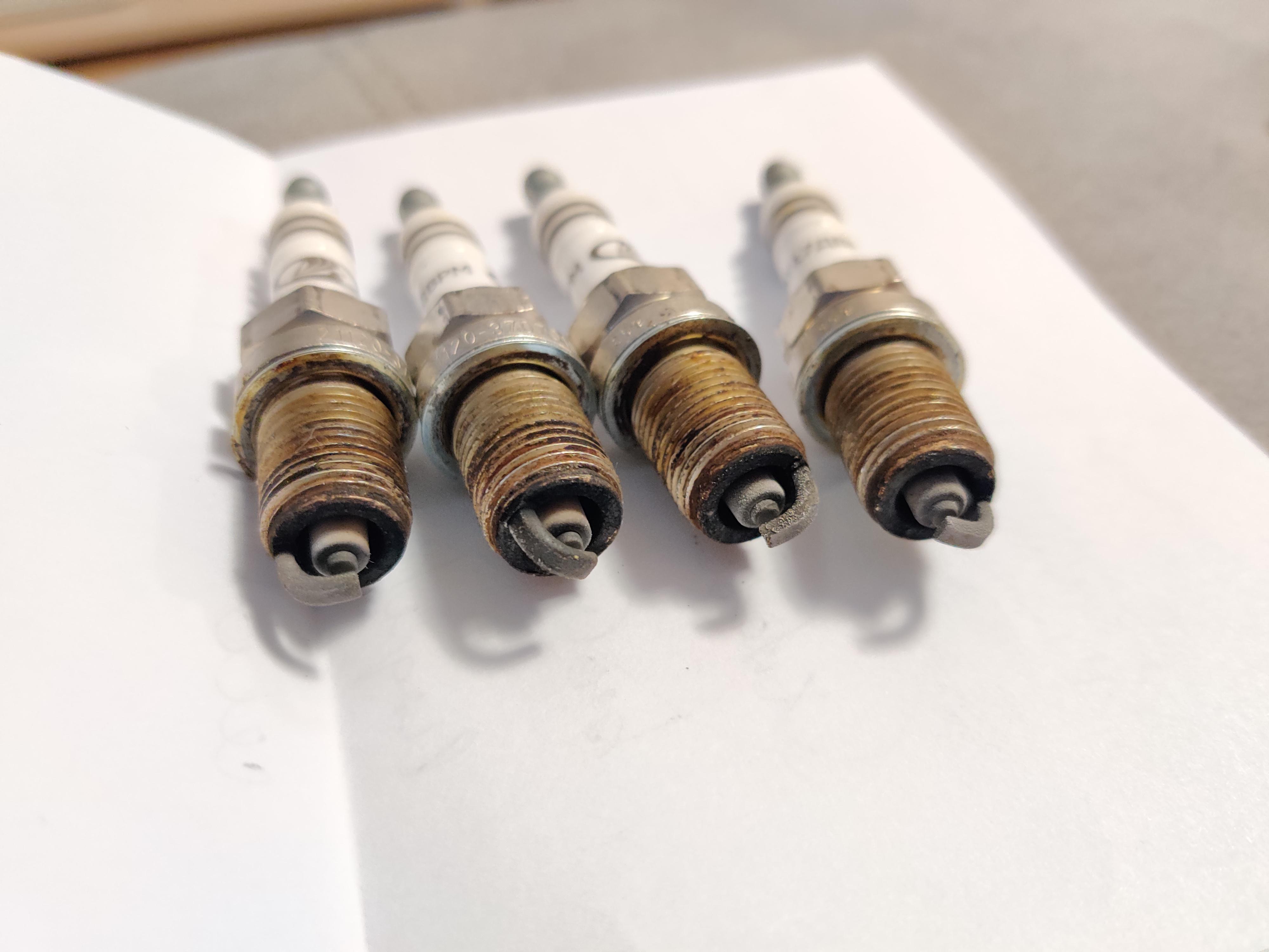 Car experts, need your comments on my spark plugs after 30k kms? I am particularly interested if