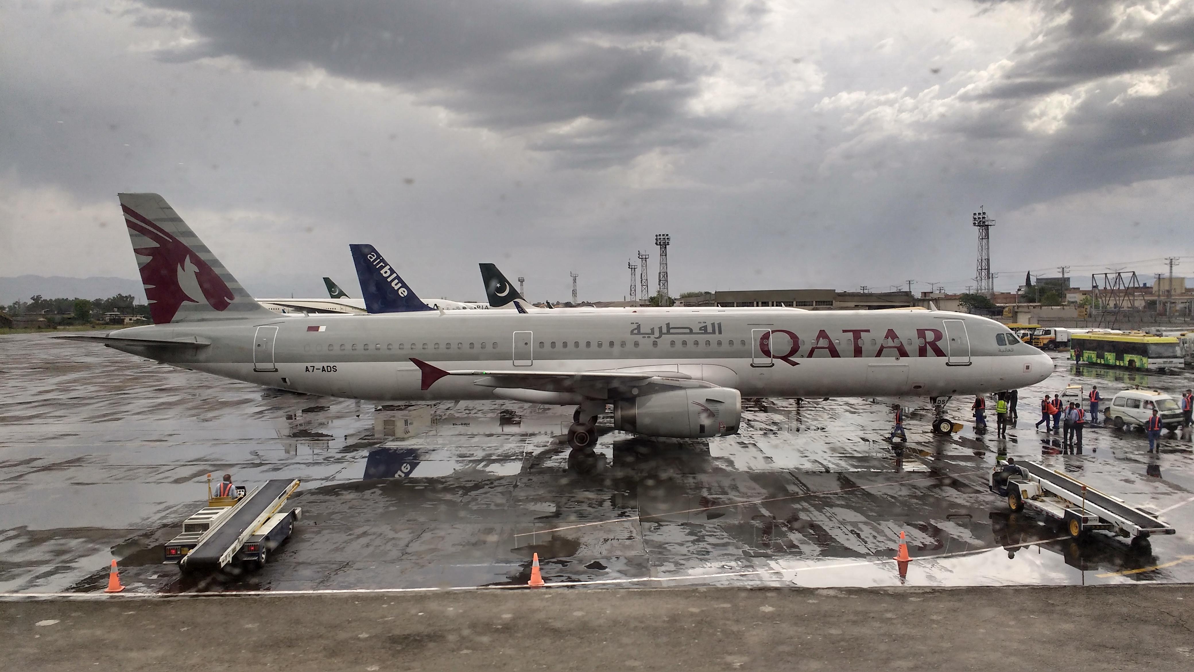 A Qatar Airways A321 at a very wet Islamabad Airport aviation