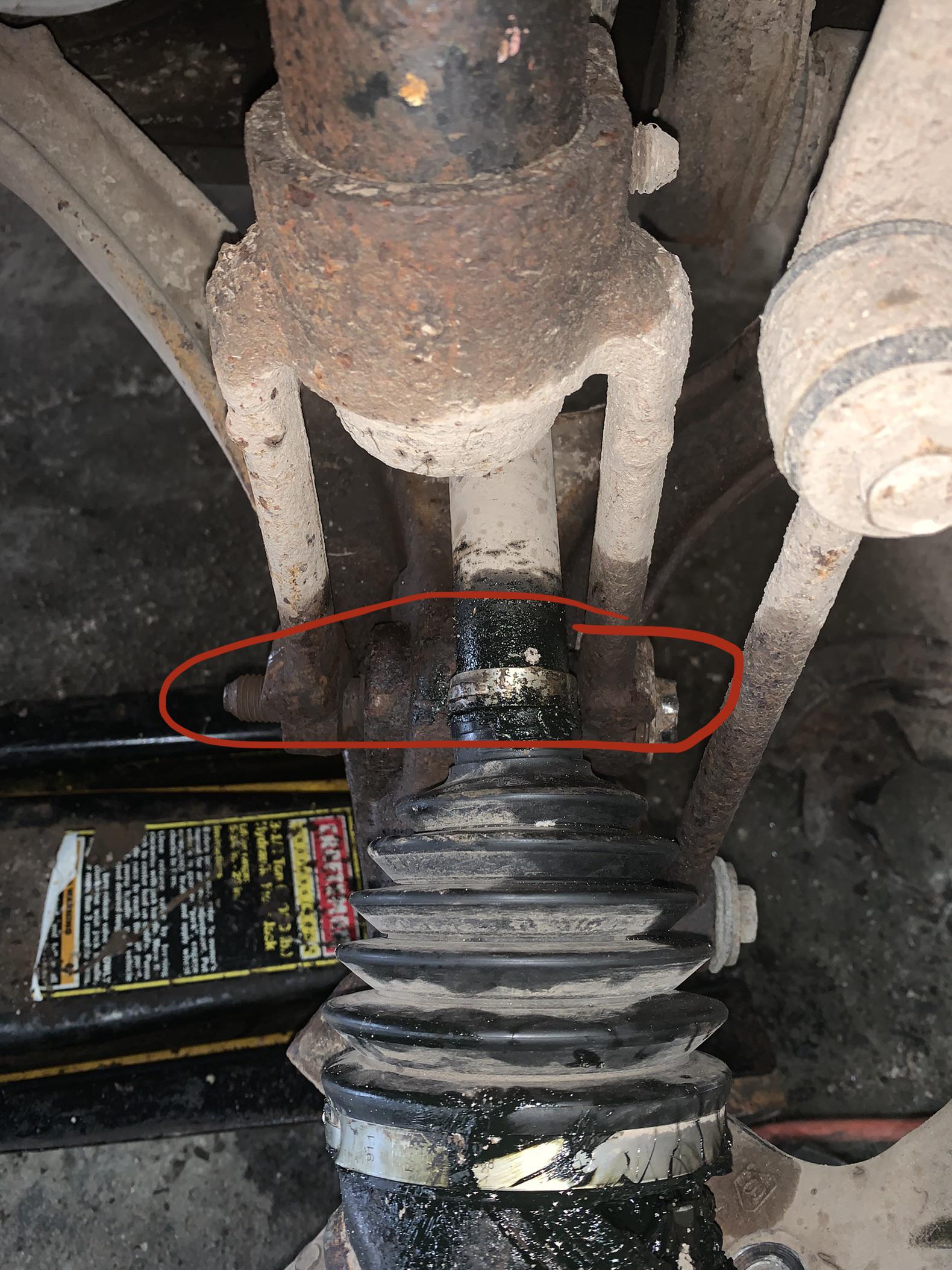 Does anyone have any tricks for getting this lower control arm bolt out