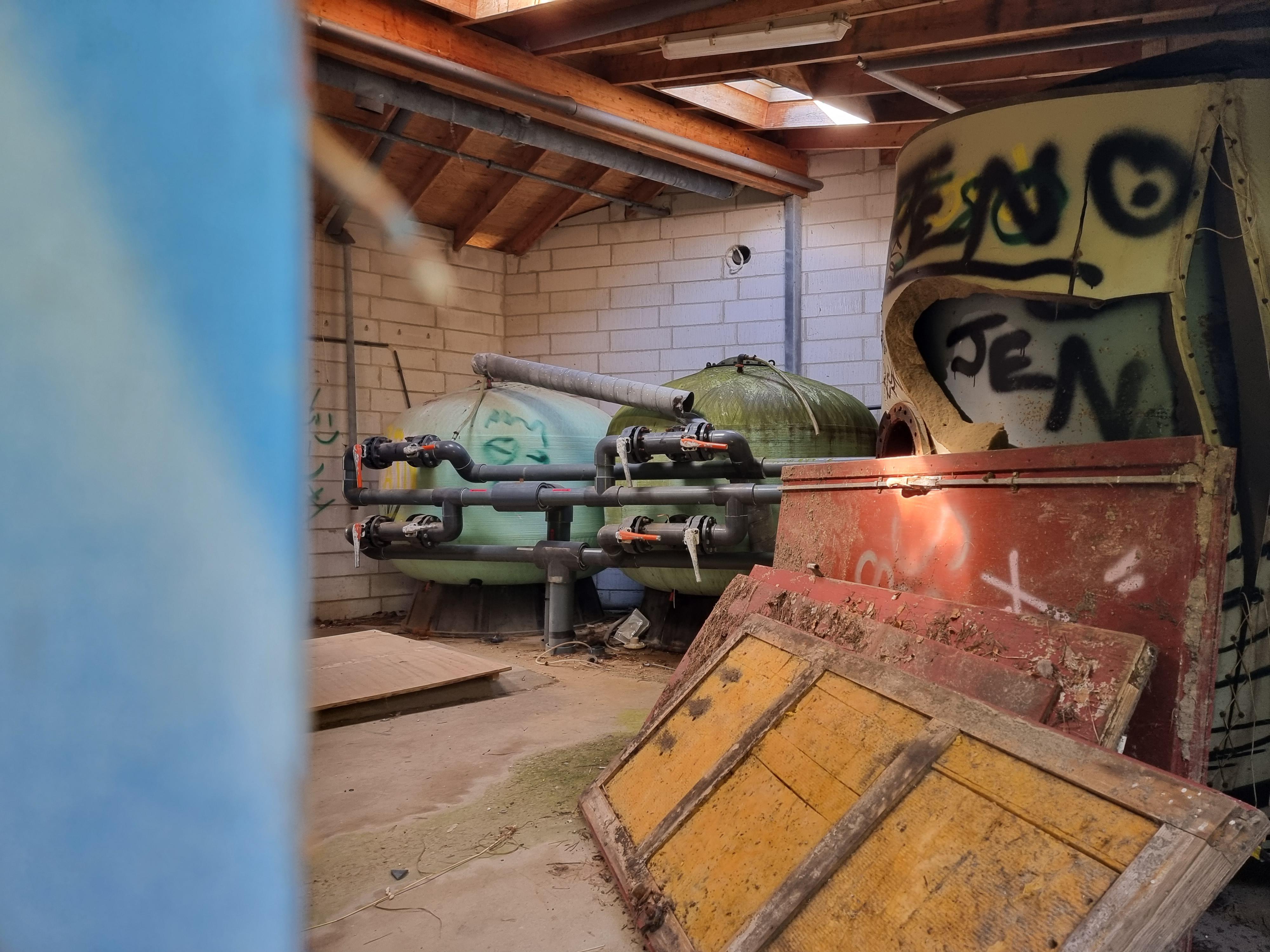What I'd assume is a boiler room, in abandoned amusement park