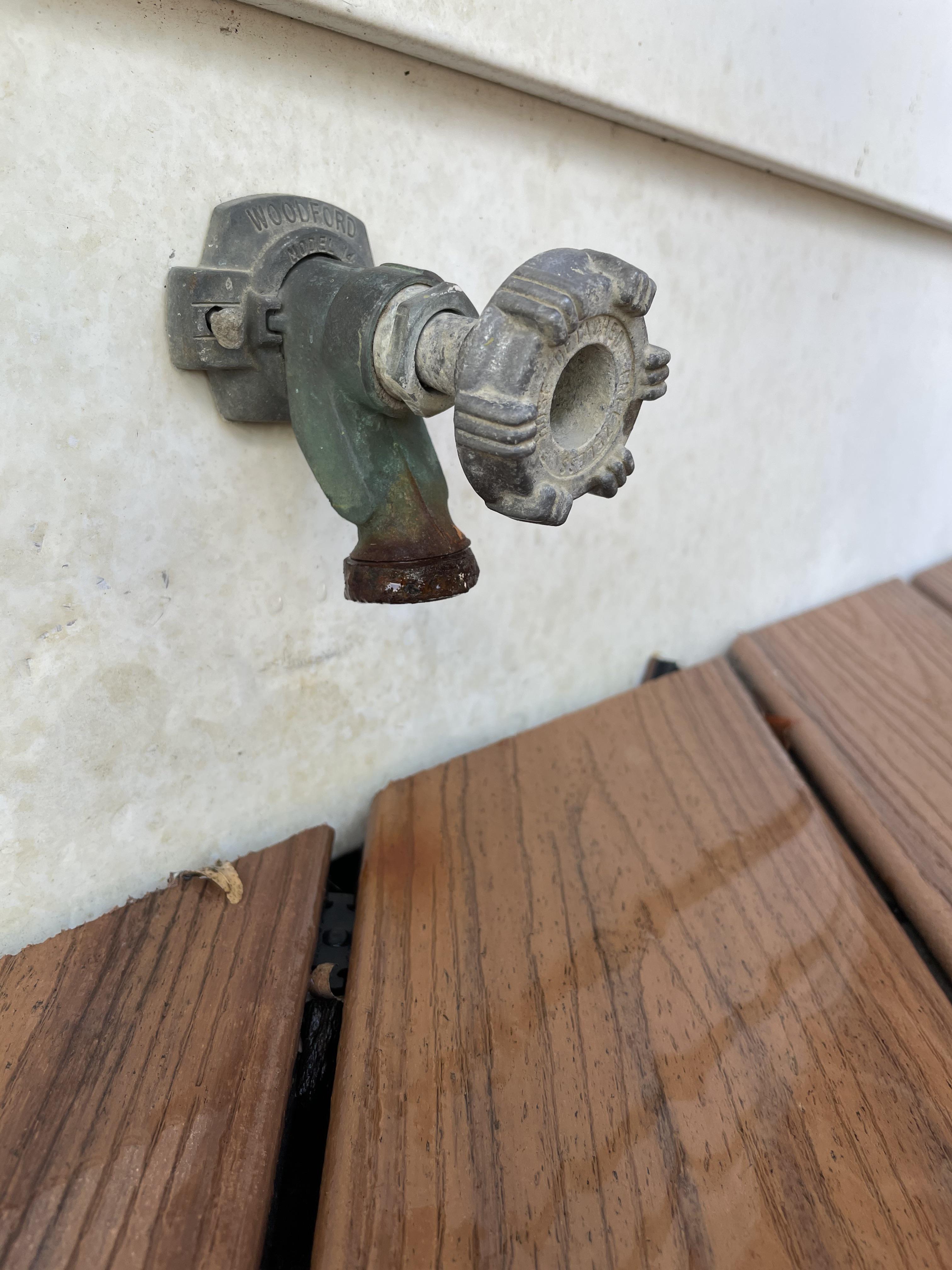 How to take the rusted end of a hose off this spout. It broke off and I