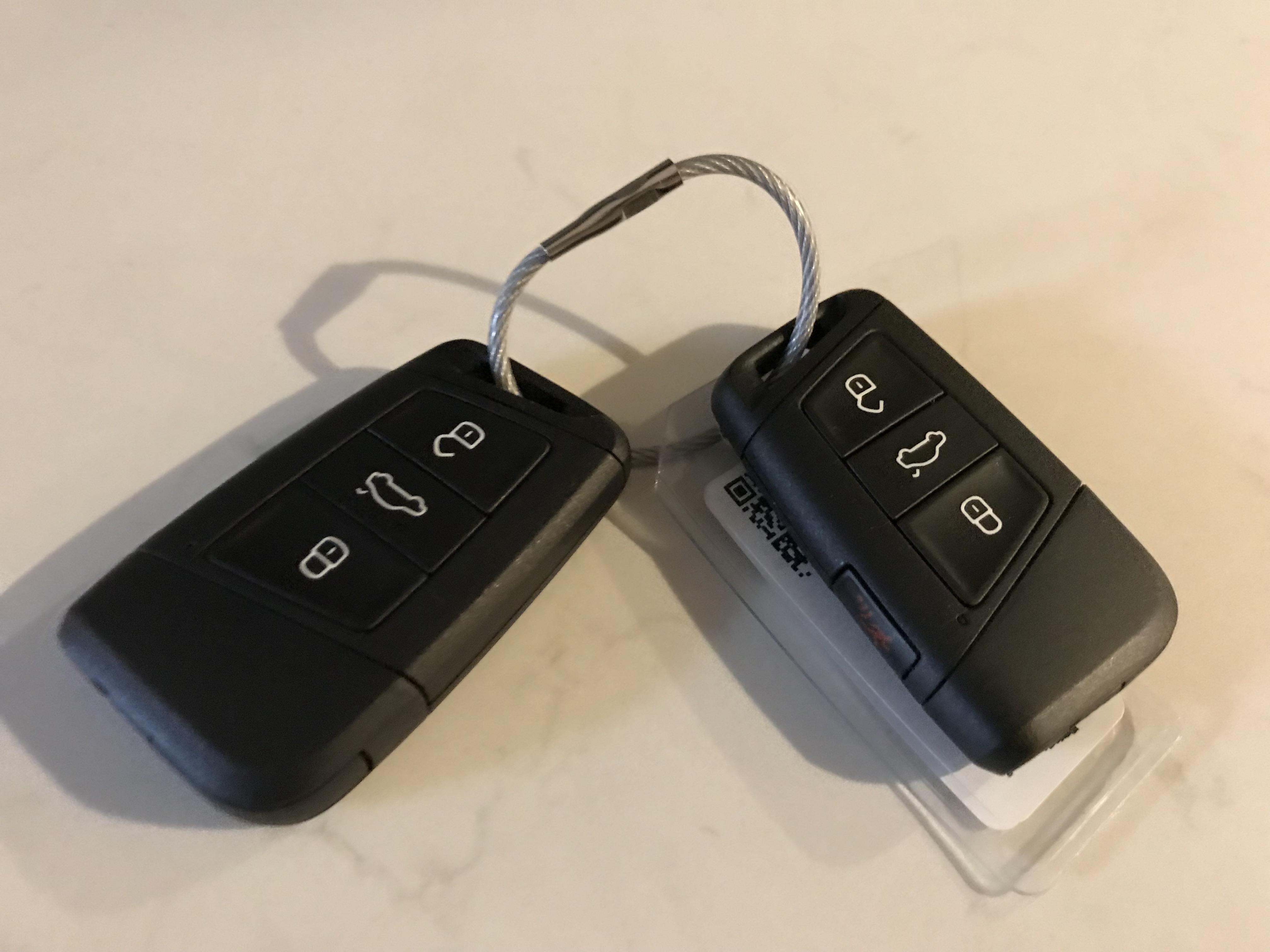Giving you two keys for the rental car but permanently attaching them