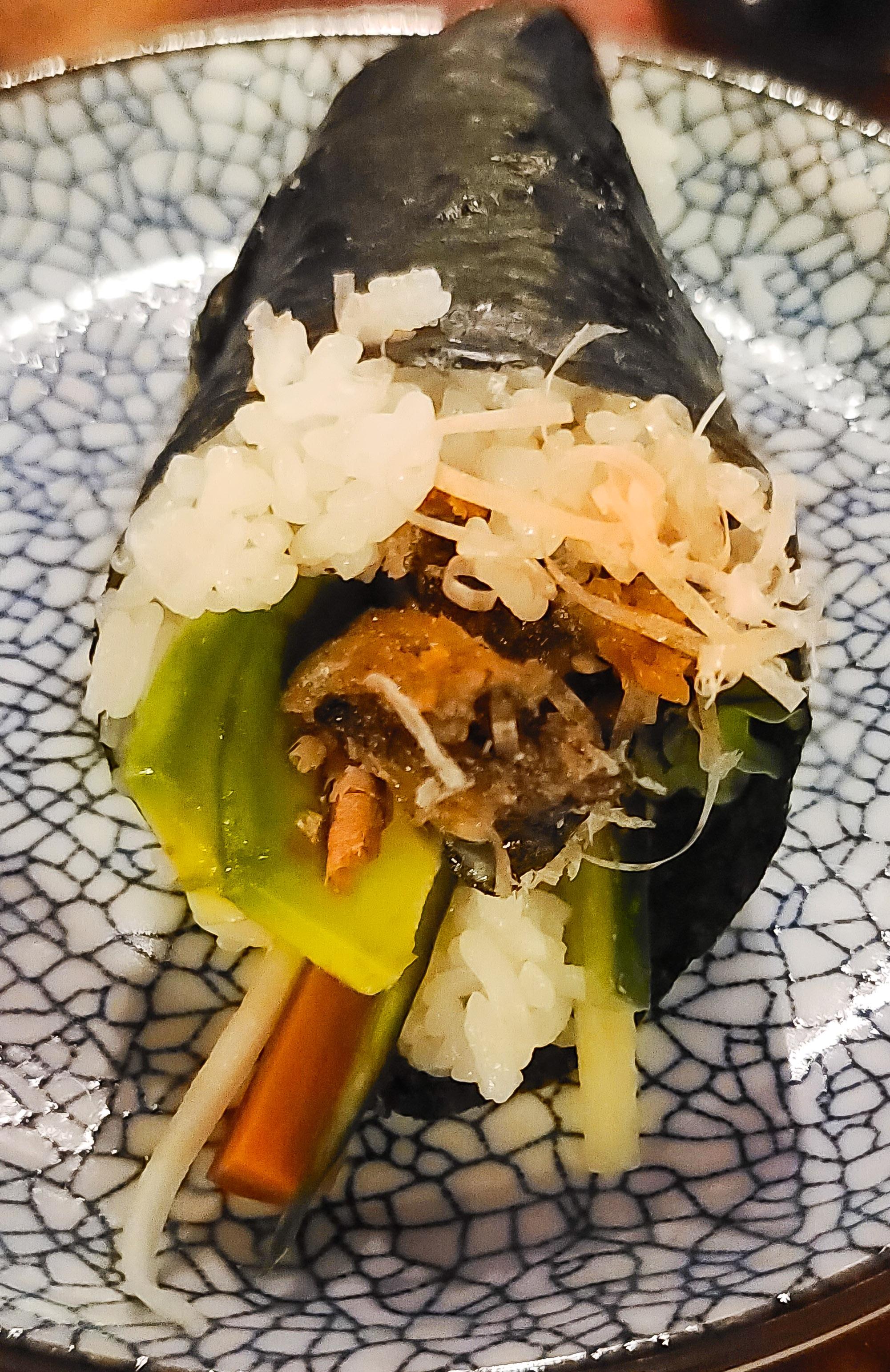 a hand roll with salmon skin veggies and I added cream cheese r/sushi