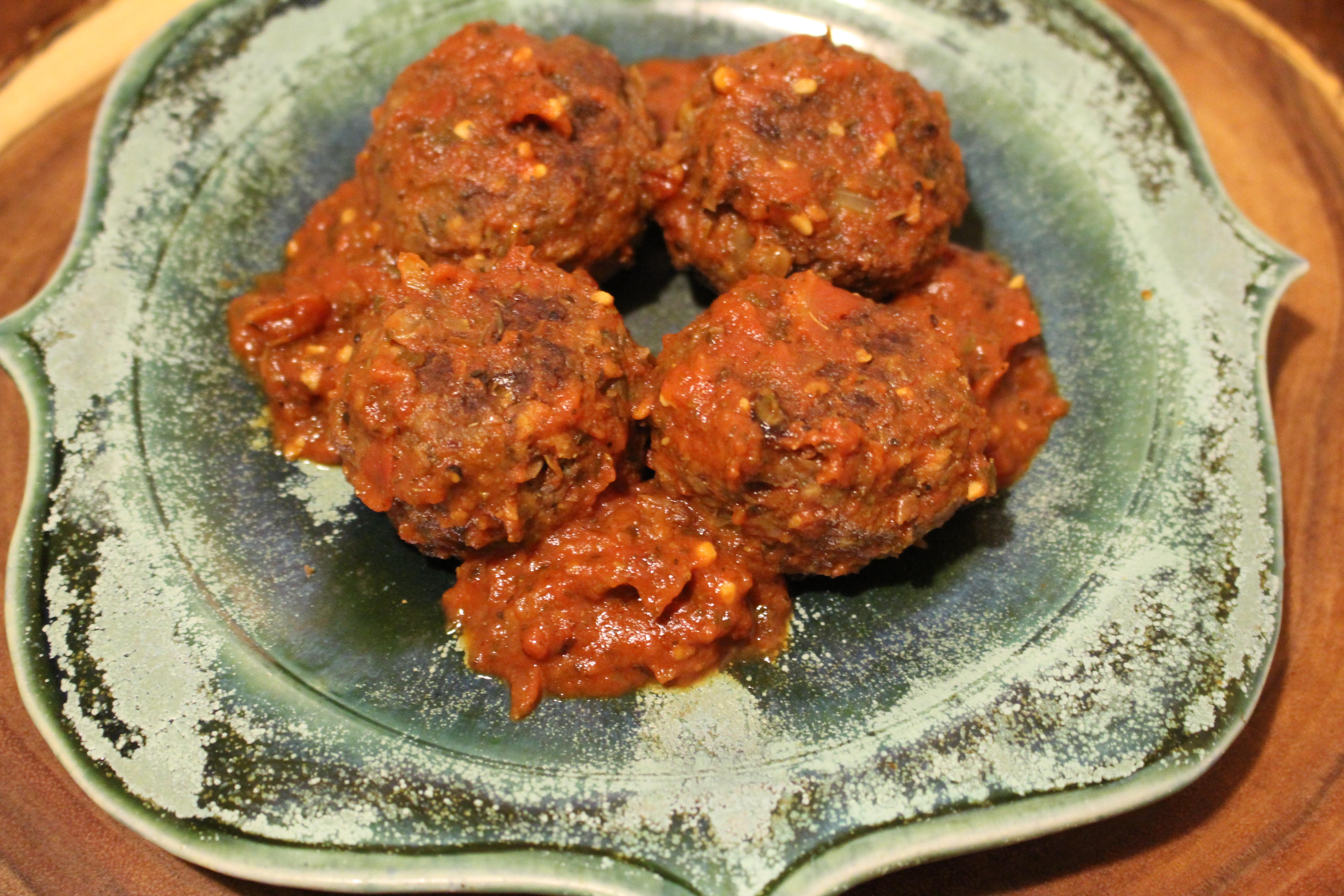 Made some lentil and nut "meat" balls with a rich tomato sauce last
