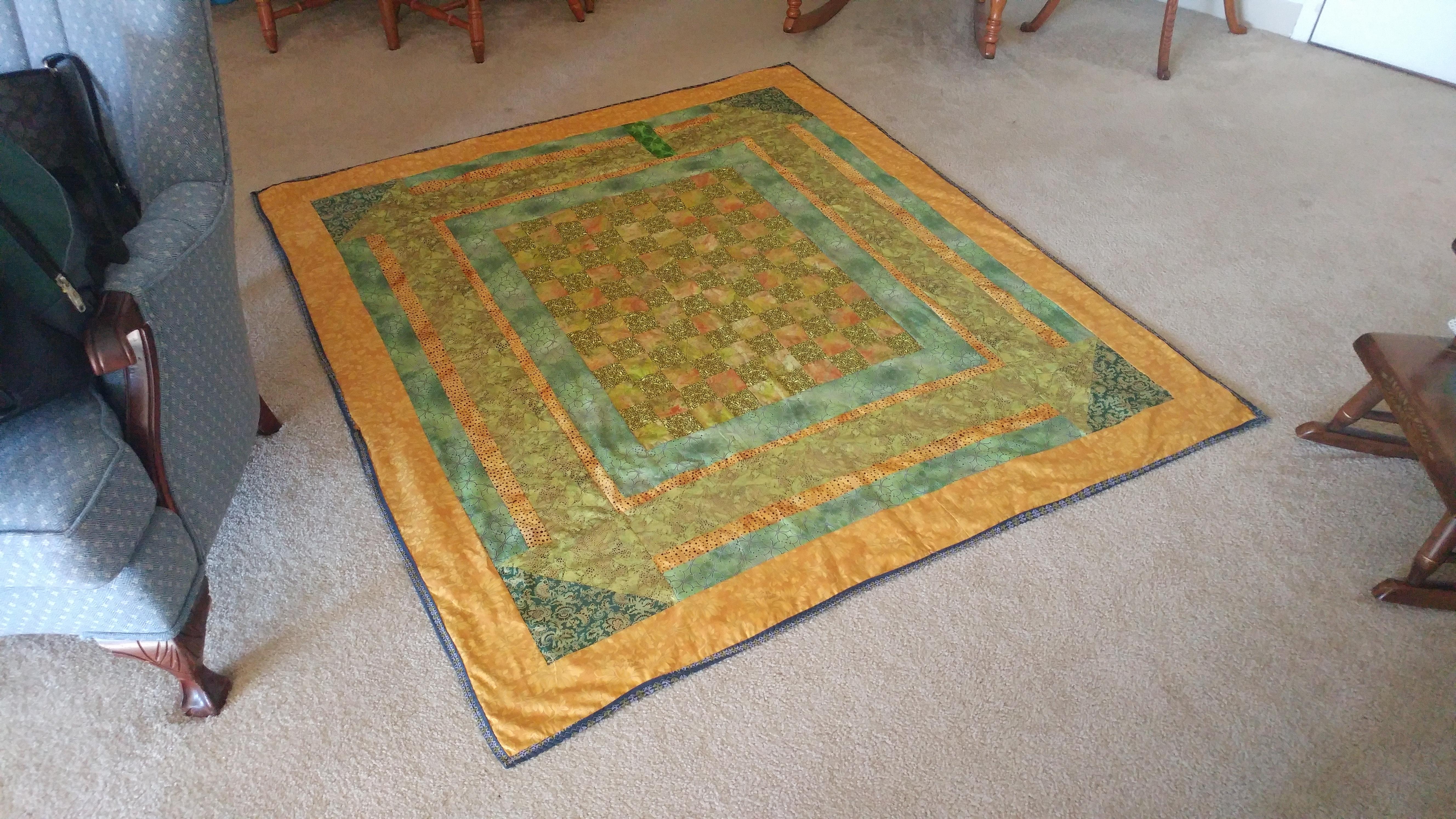 Green and gold quilt for mom is done and delivered and being used! The
