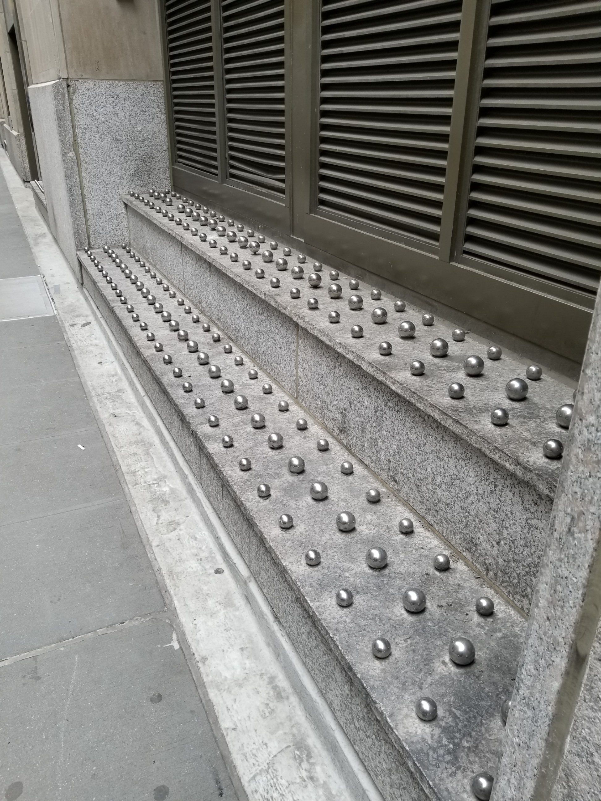 Hostile Design This wall that discourages you from sitting or laying