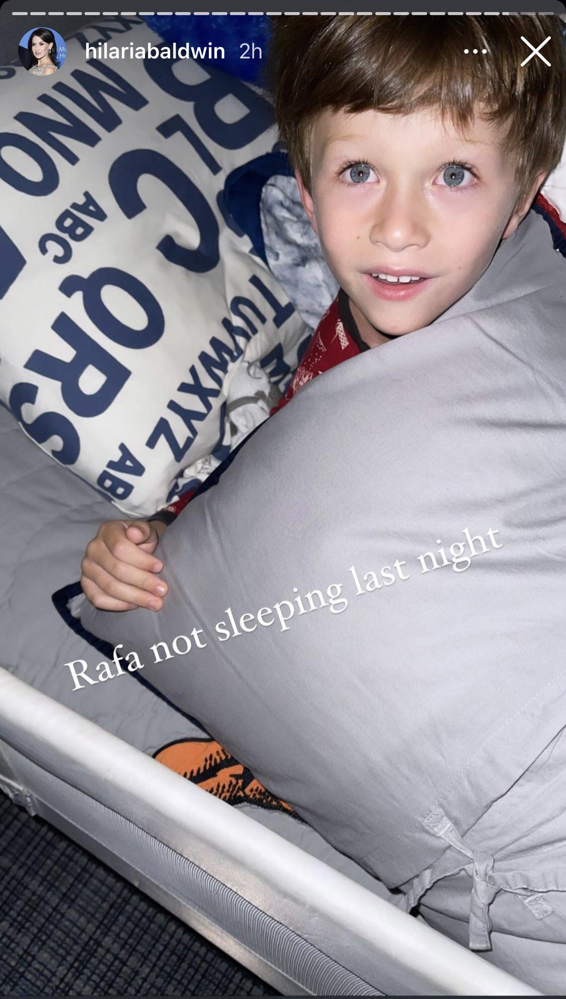 Of course he’s not sleeping. Not with the camera flash in his eyes 😳