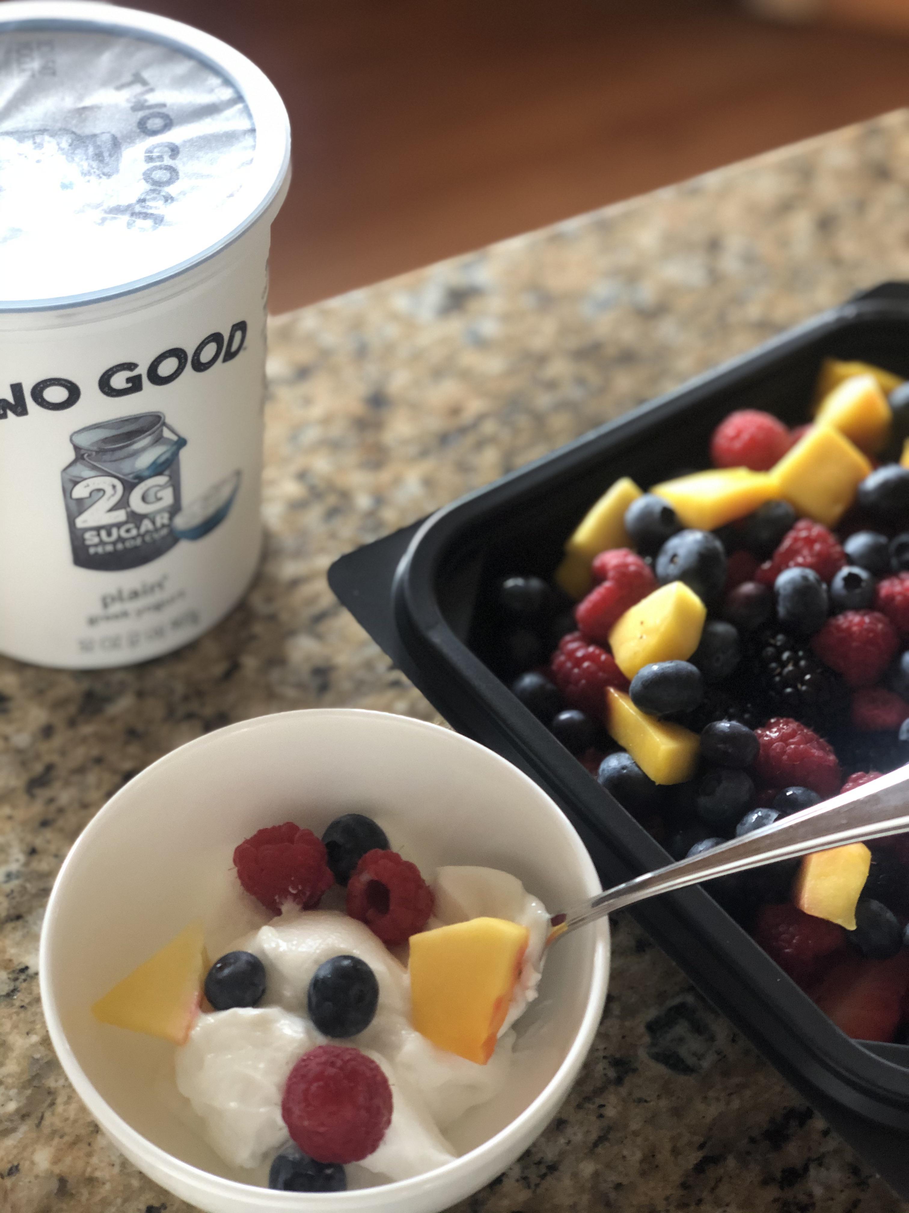 My go to breakfast! 3/4 cup of yogurt for 90 calories and fresh fruit on top. Super healthy and