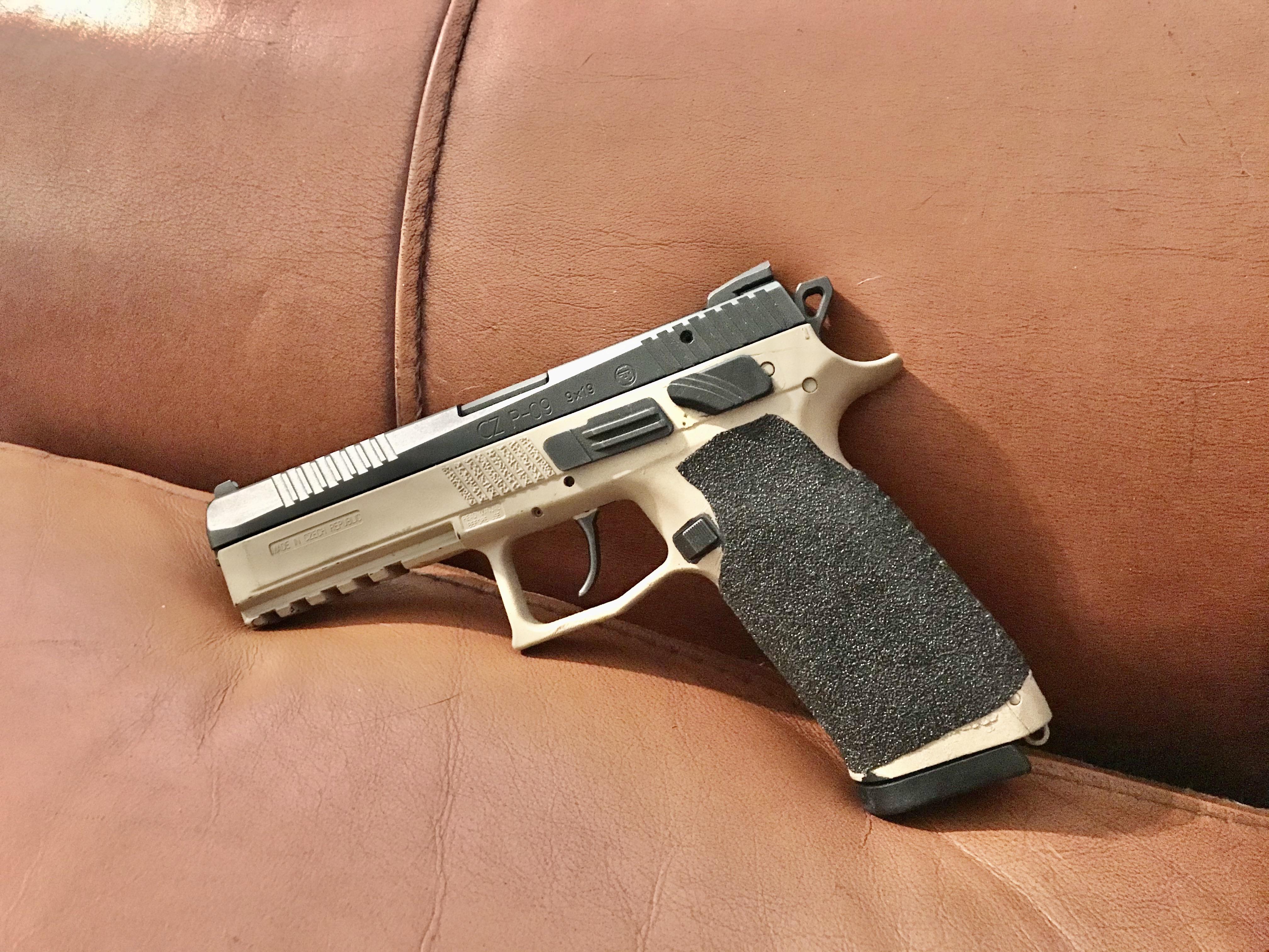 Got bored of the all black, my 5 spray paint and grip tape job. r/guns