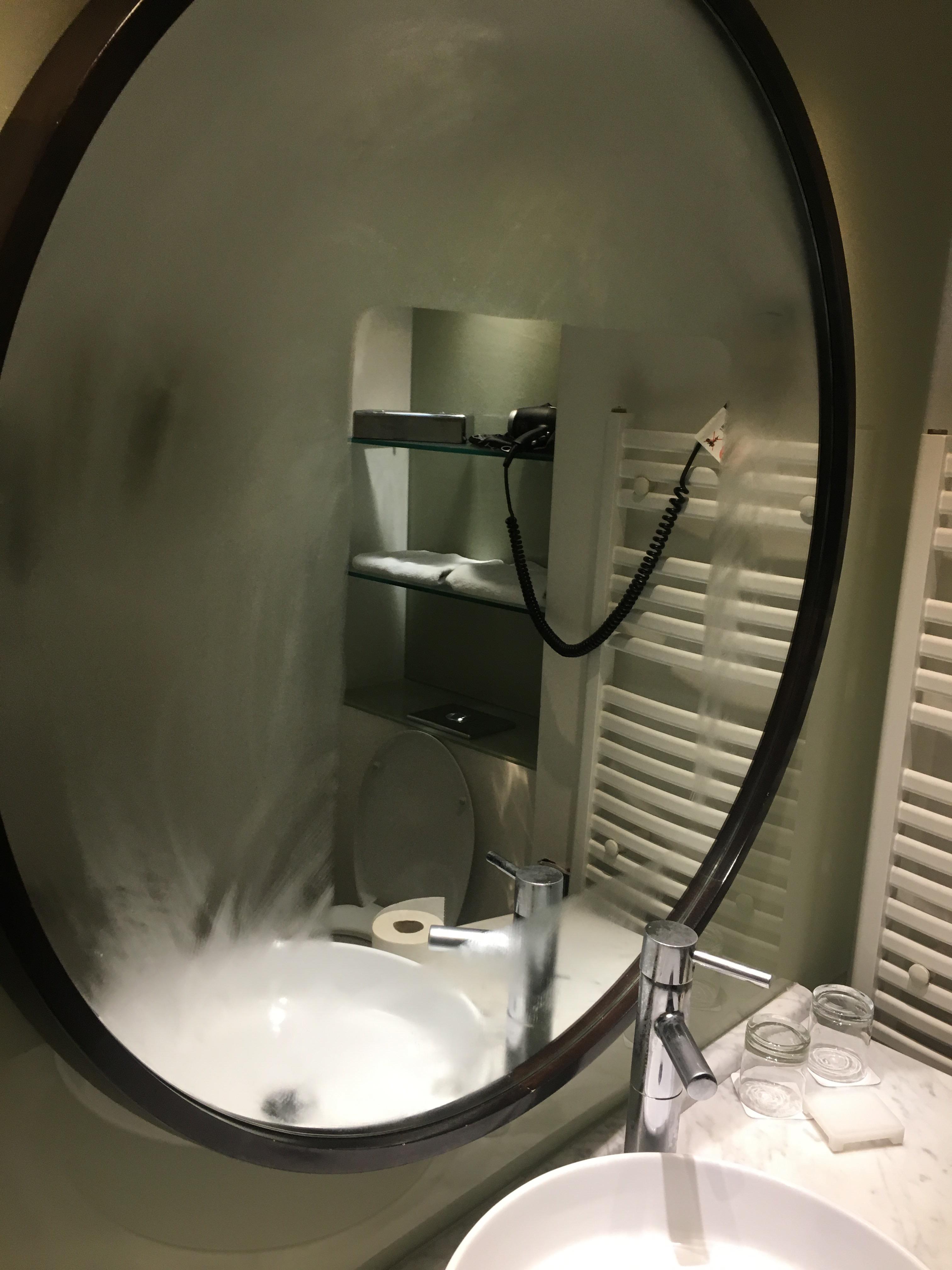 Why Does A Mirror Fog Up After A Hot Shower The mirror in this hotel never fully steams up even after a hot shower