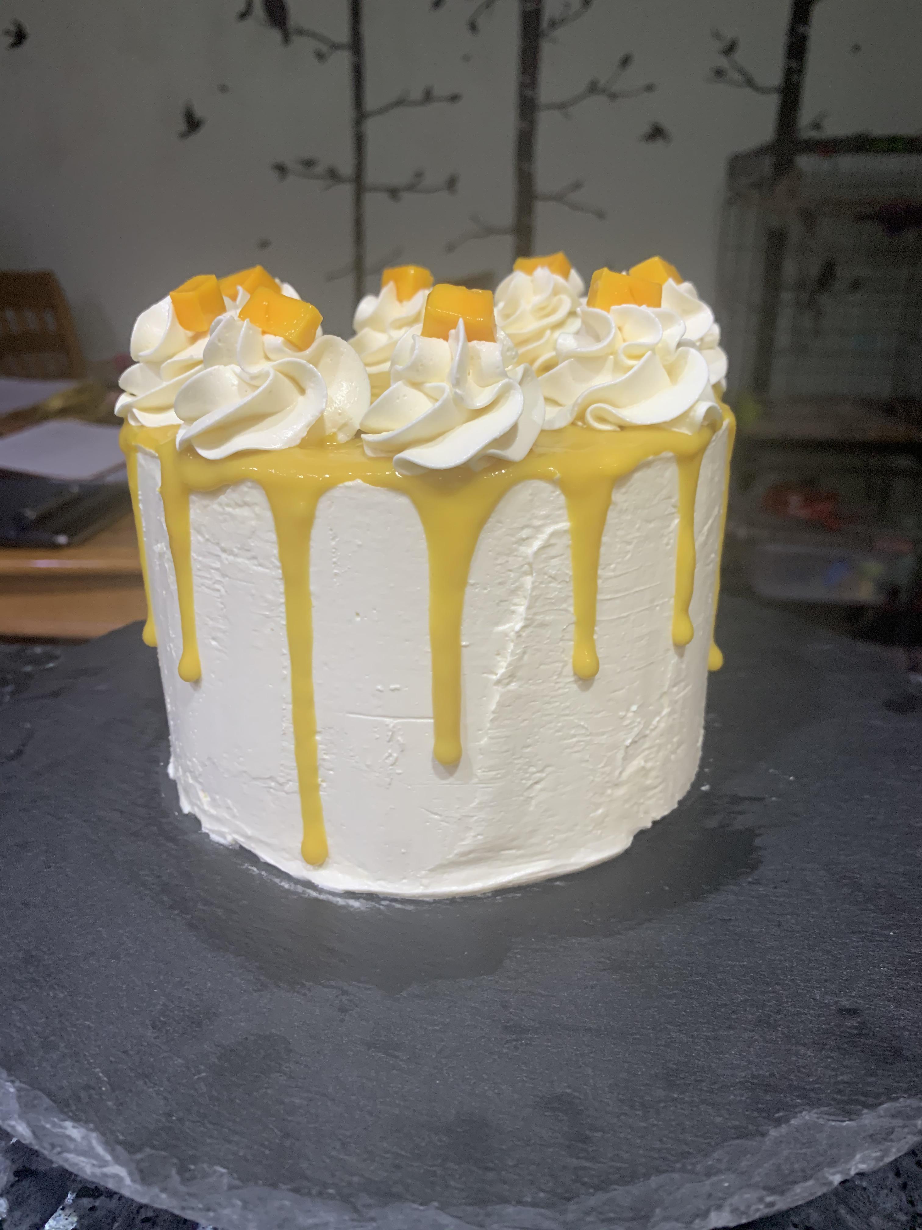 Lemon Mango Cake with Italian Meringue Frosting. My first time doing a