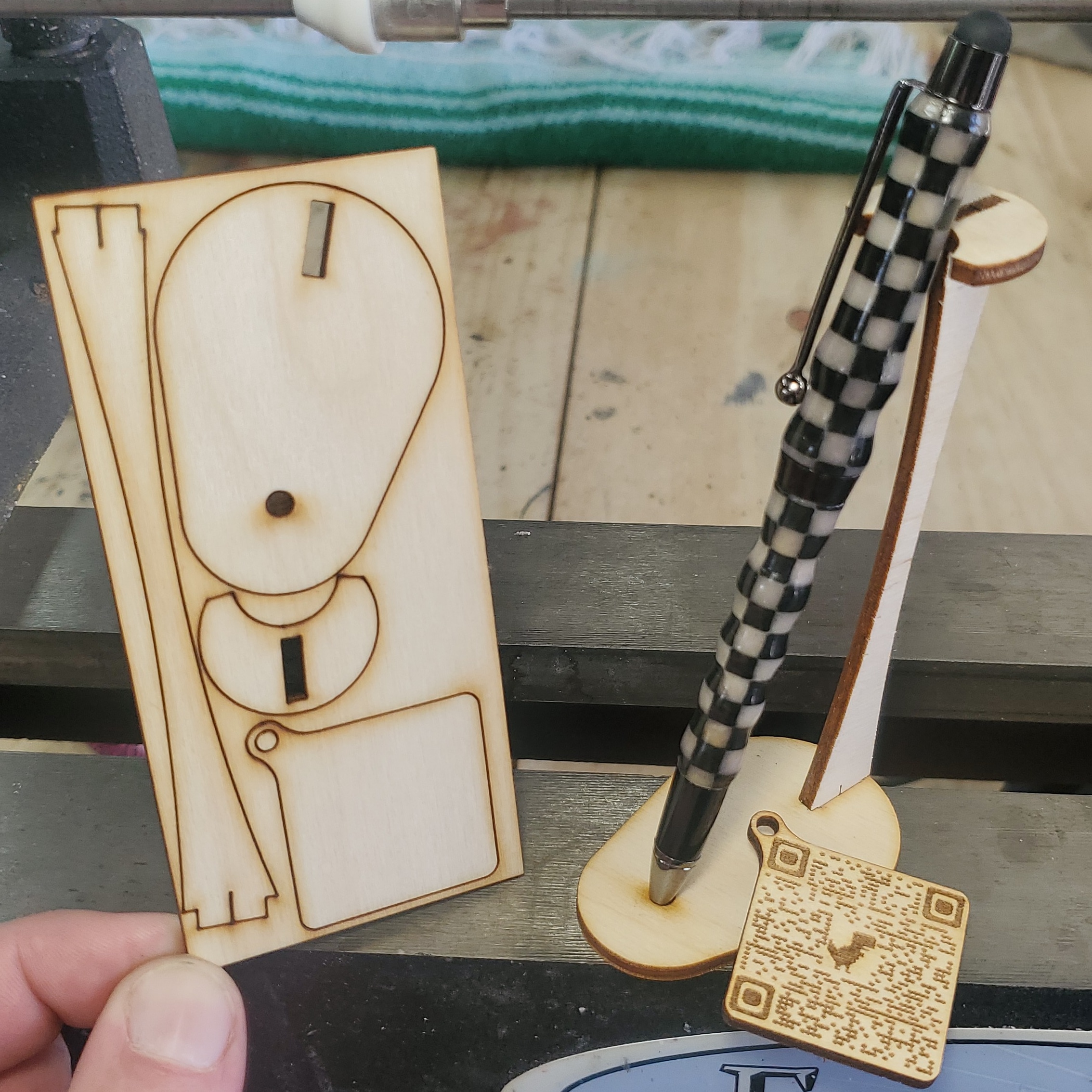 I made this laser cut pen stand with included price and description tag