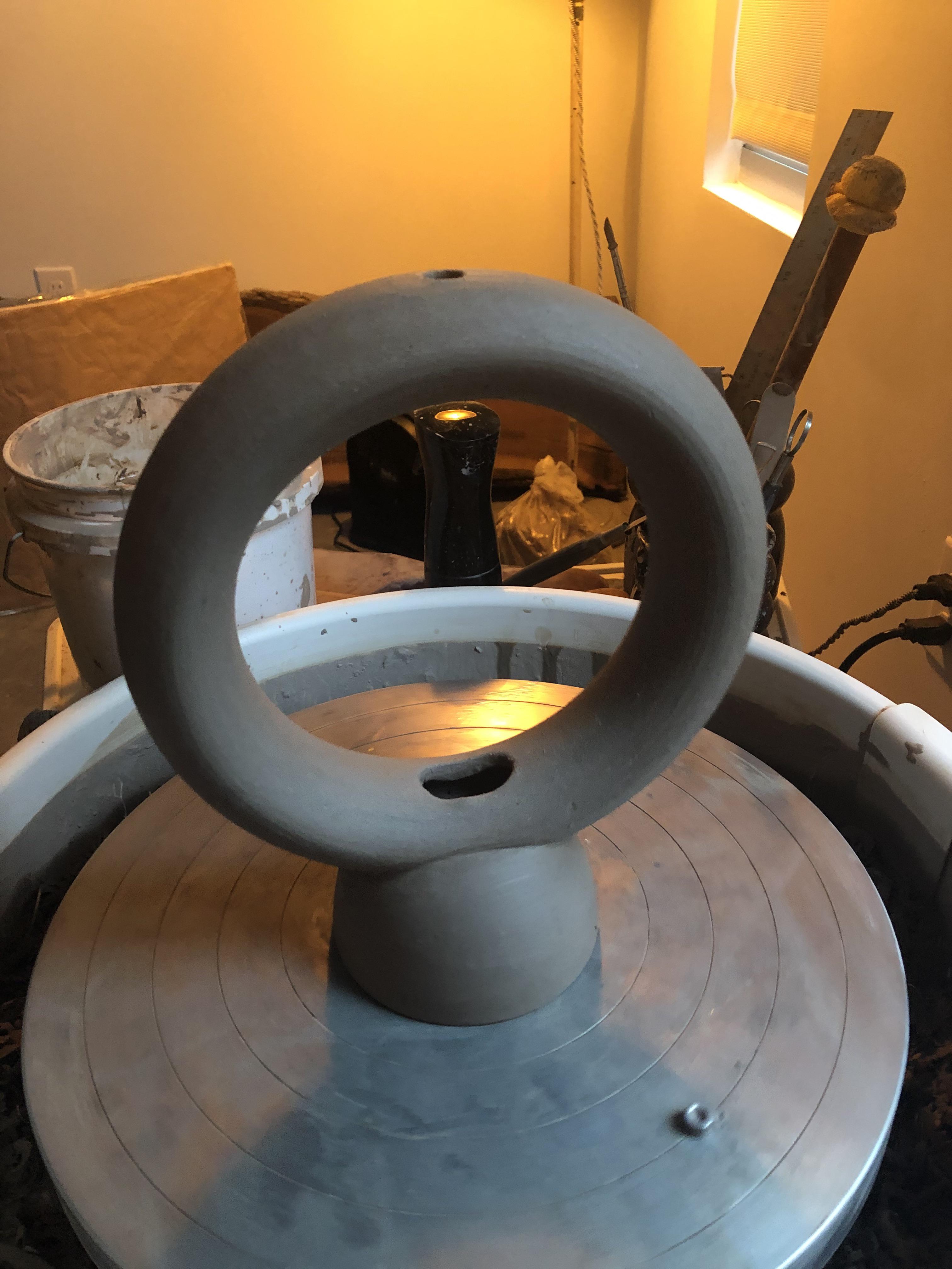 My first attempt at throwing a donut to make a vase. Far from perfect