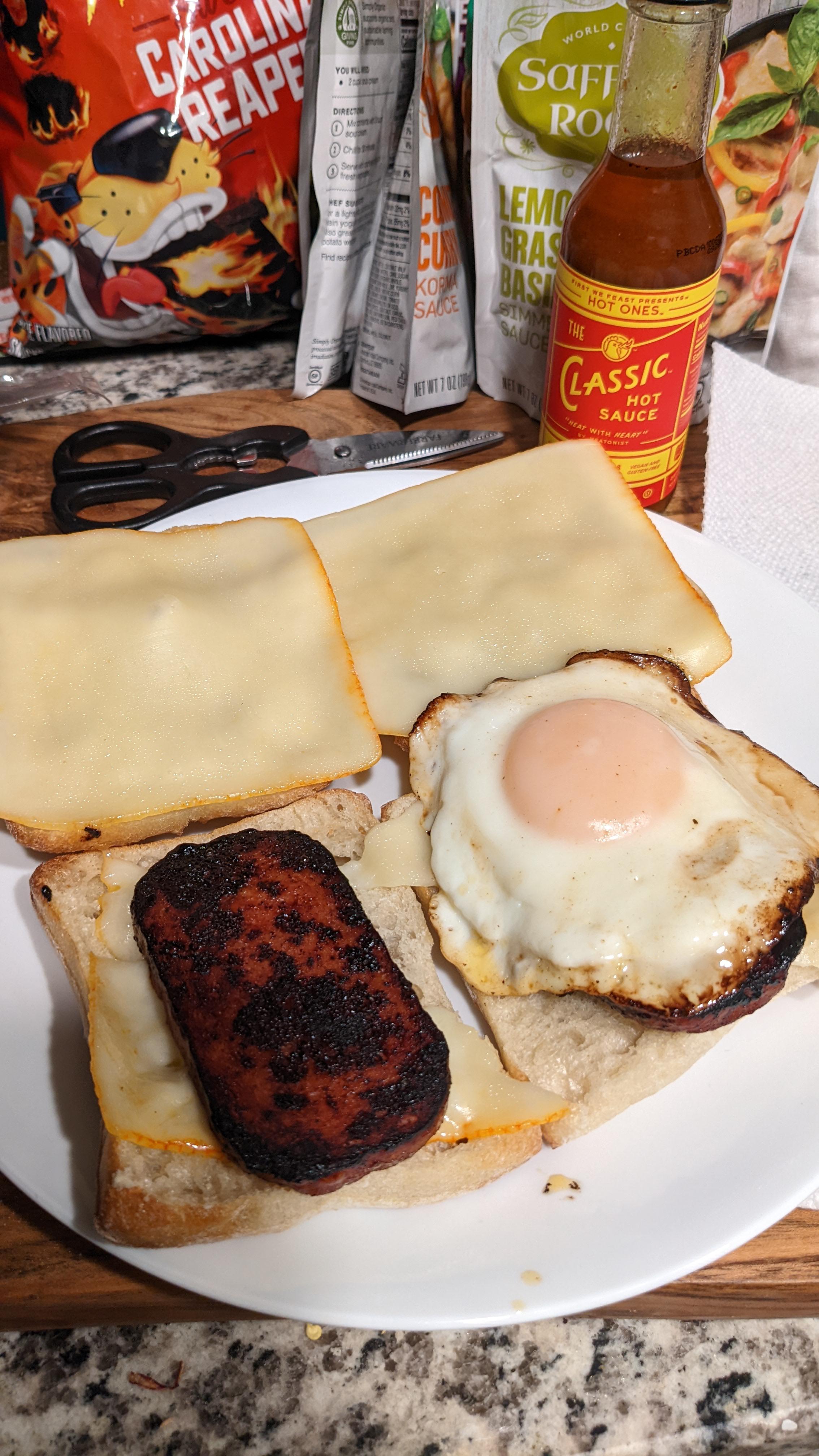 Breakfast sandwiches with some hot ones classic sauce hotsauce