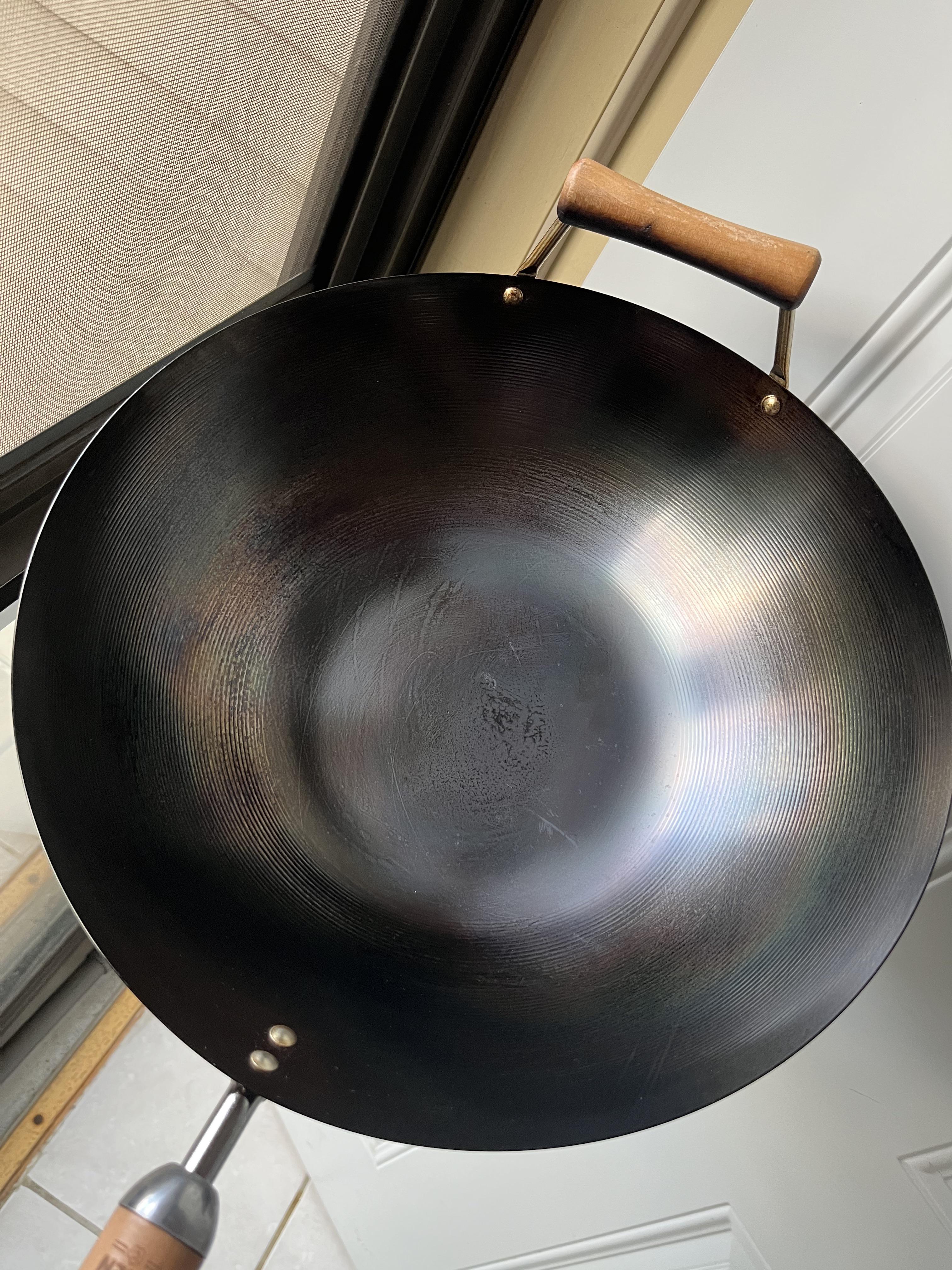Can’t get my wok to turn black in the middle while seasoning. The sides