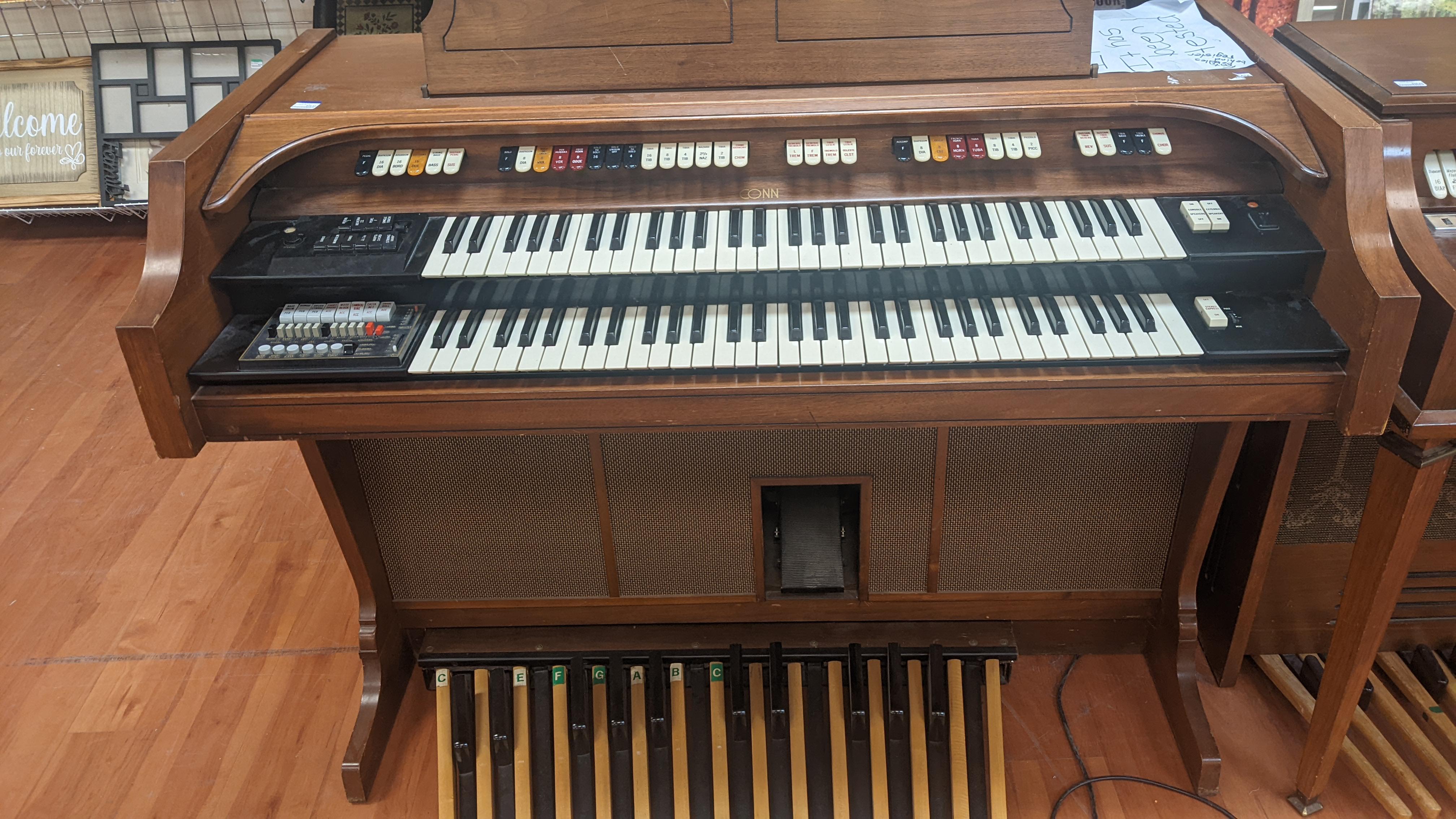 Please help finding the model of this Conn electric organ.
